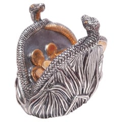 Portafortuna in miniatura con placcatura in oro e argento