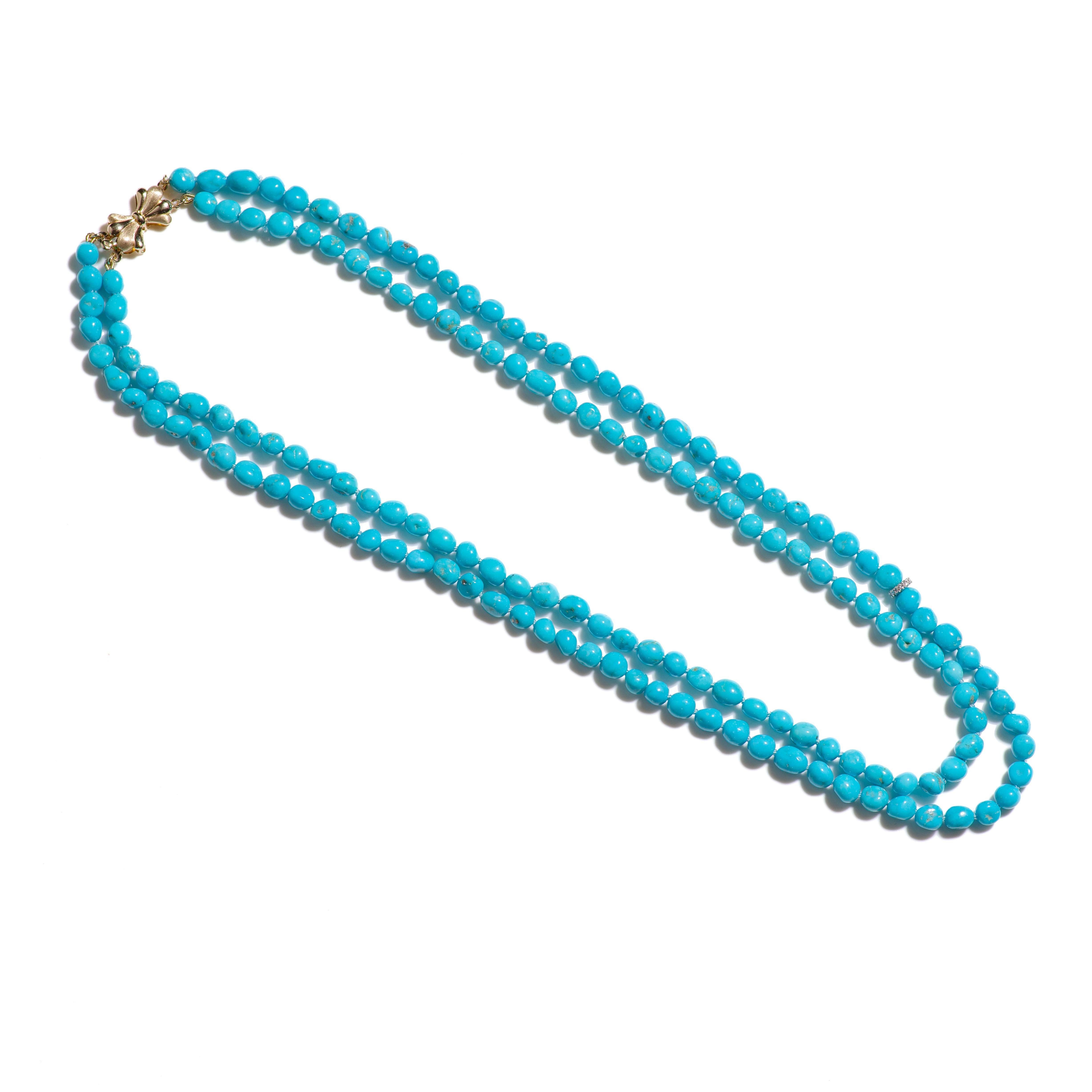 A regal double layered sky blue necklace with extremely rare and pure Sleeping Beauty Turquoises. This necklace features genuine high grade Robinson Egg Blue turquoises from the sleeping beauty mine in Arizona, delicately strung together with a