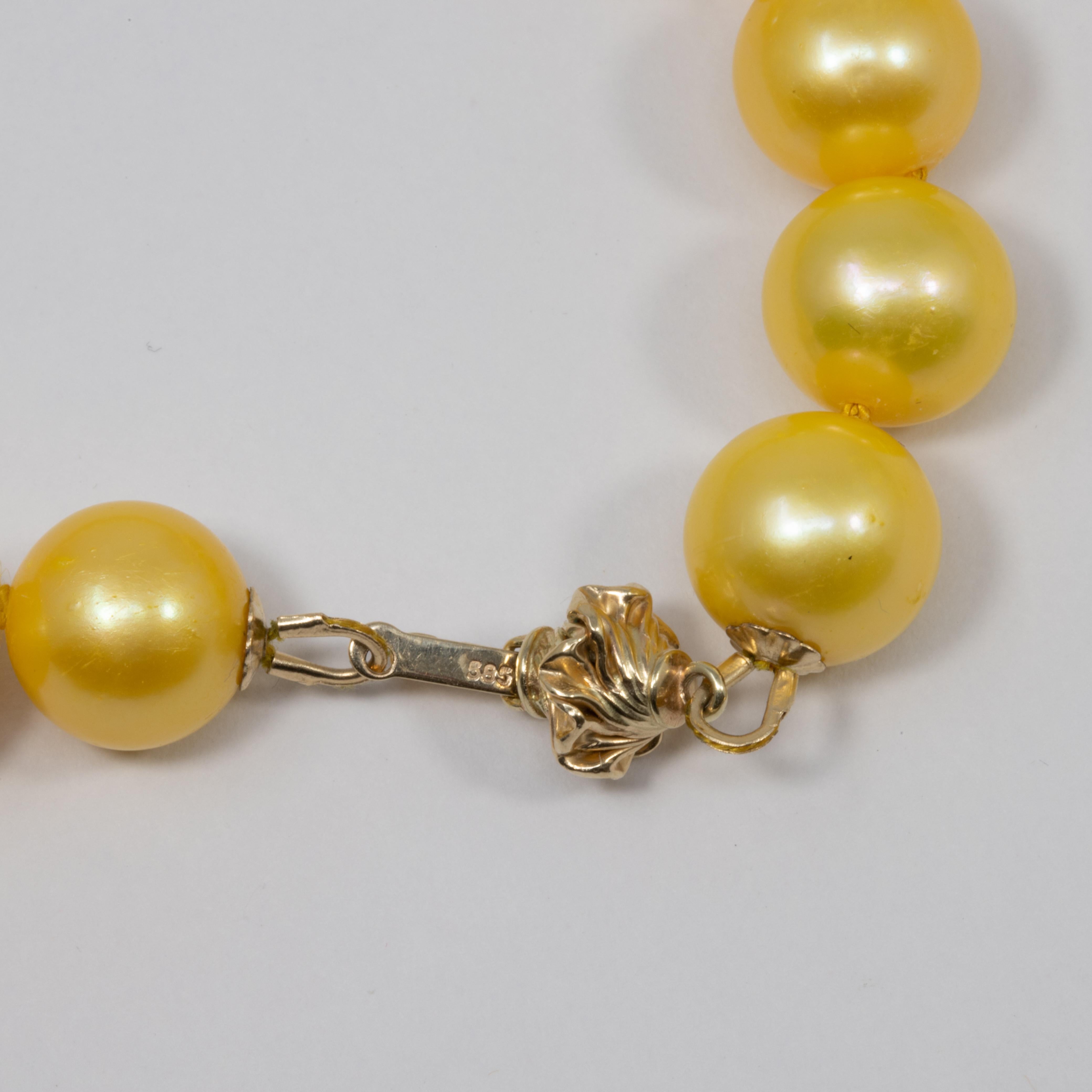 Genuine South Sea Pearl Bead Knotted String Necklace with 14 Karat Yellow Gold For Sale 1