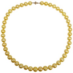 Collana con cordoncino annodato di perle autentiche dei mari del sud e oro giallo 14 carati
