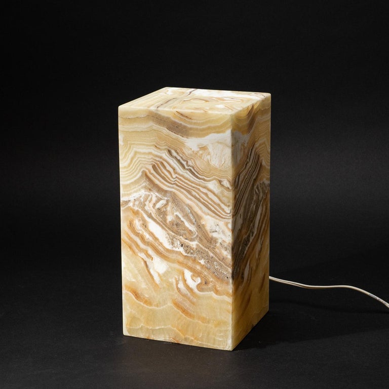 Medium square lamp composed of Natural banded Mexican onyx. This beautiful lamp is crafted from natural onyx with sophisticated appeal. lamp will look great in your home as a perfect accent to lighting in various rooms.
In crystal healing, Banded