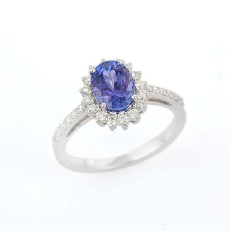 En venta: Anillo de compromiso de tanzanita auténtica con halo de diamantes en oro blanco macizo de 18k  10