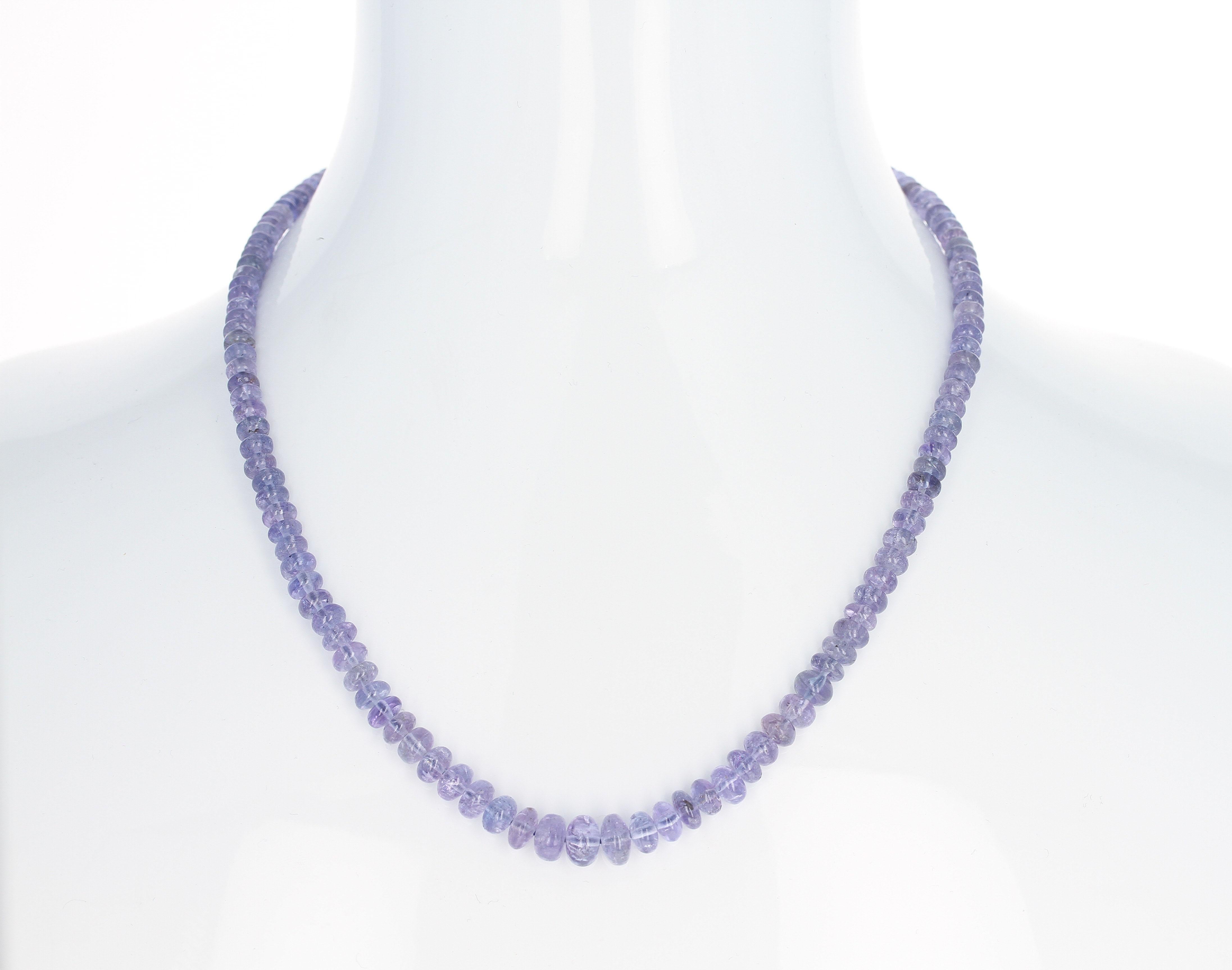 A strand of Genuine Tanzanite Smooth Beads with a Sterling Silver Toggle Clasp. Length: 20.