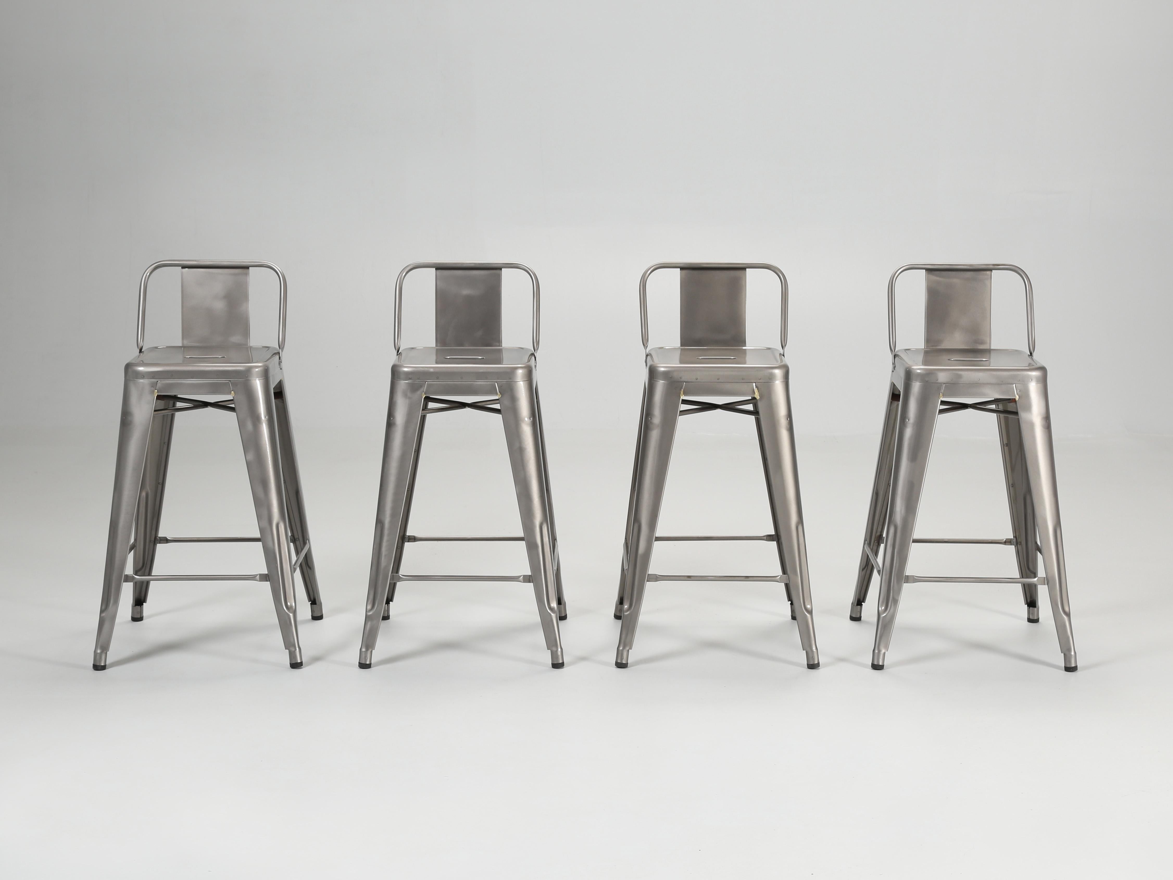 French made Tolix Counter Stools with a protective clear-coat applied at the factory in France. We also have in stock the same stool with the low backrest, but in raw steel that you could paint. They too will be listed on 1stdibs as will all of our