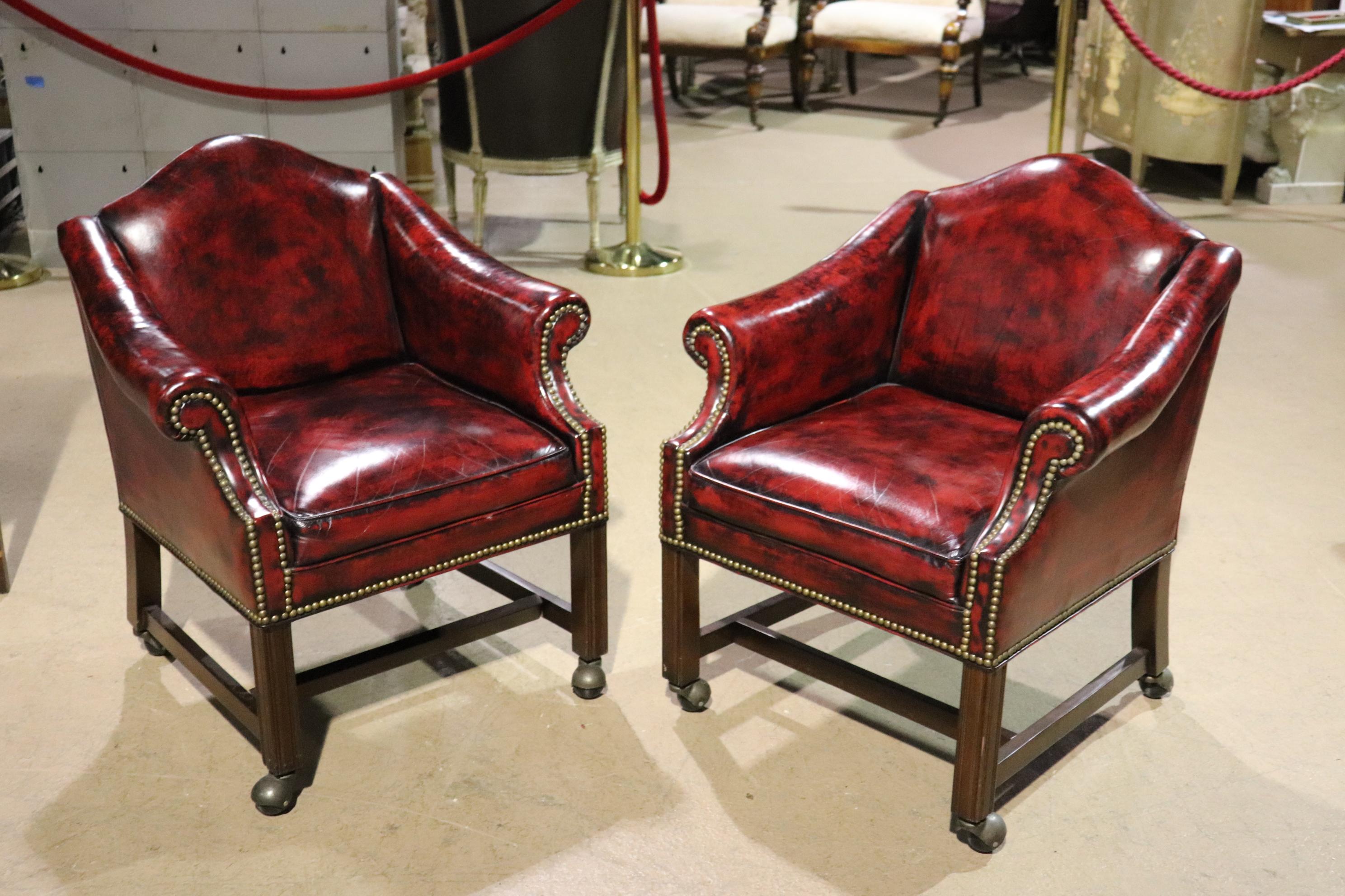 These are sophisticated chairs in a simple way. They are perfect for a law office and in very good original 1970s vintage condition. They each measure 34 tall x 27 wide x 28 deep and the seat height is 19 inches tall. The leather is in very very