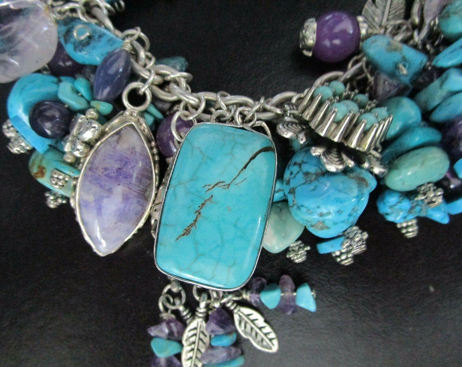 Custom made Vintage Genuine Blue Turquoise, Amethyst and Sterling Silver Multi Charm Bracelet. Custom made. Measuring approx. 8.5