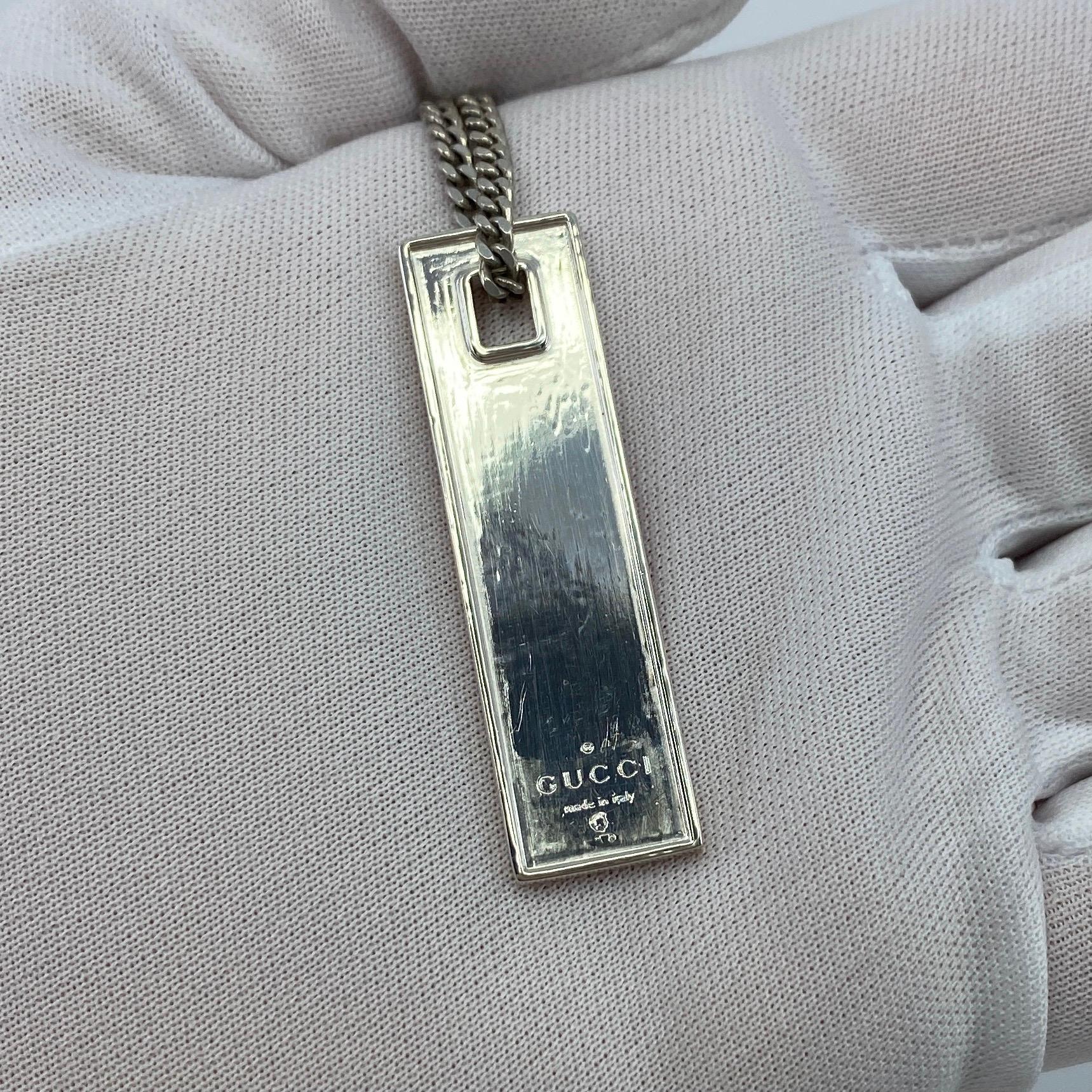 Vintage Gucci Sterling Silver Tag Pendant Necklace.

Used item, some minor scratches on it. Has been professionally cleaned and polished so very bright and shiny. 
Bracelet measures 50cm (20inch). Weighs 19.8g.
The tag measures 45x12mm

Italian
