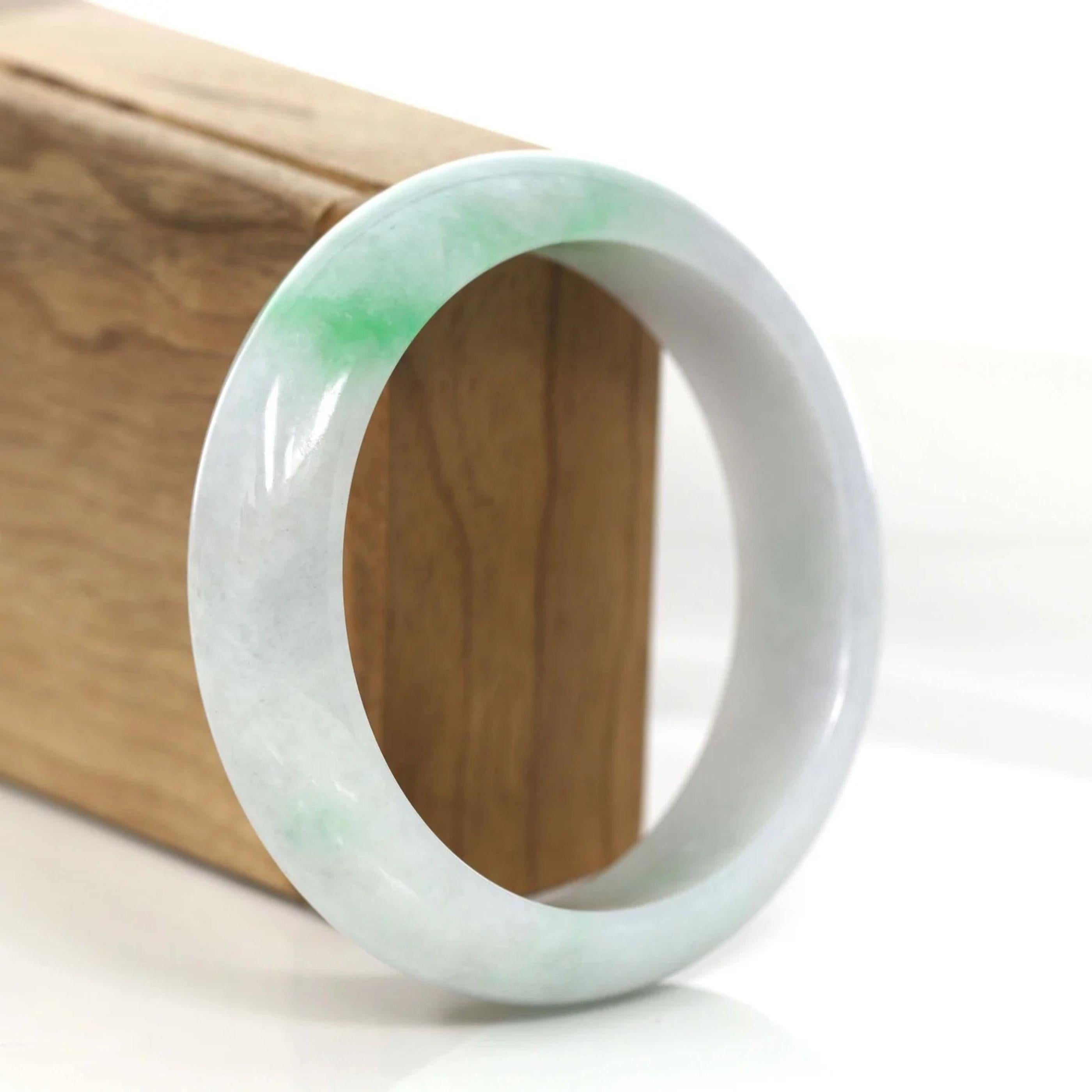 * DETAILS--- This bangle is made with high-quality genuine Burmese white Jadeite jade, the jade texture is so transparent with some green colors inside. The green color and transparency white texture, truly a mesmerizing combination. The Classic