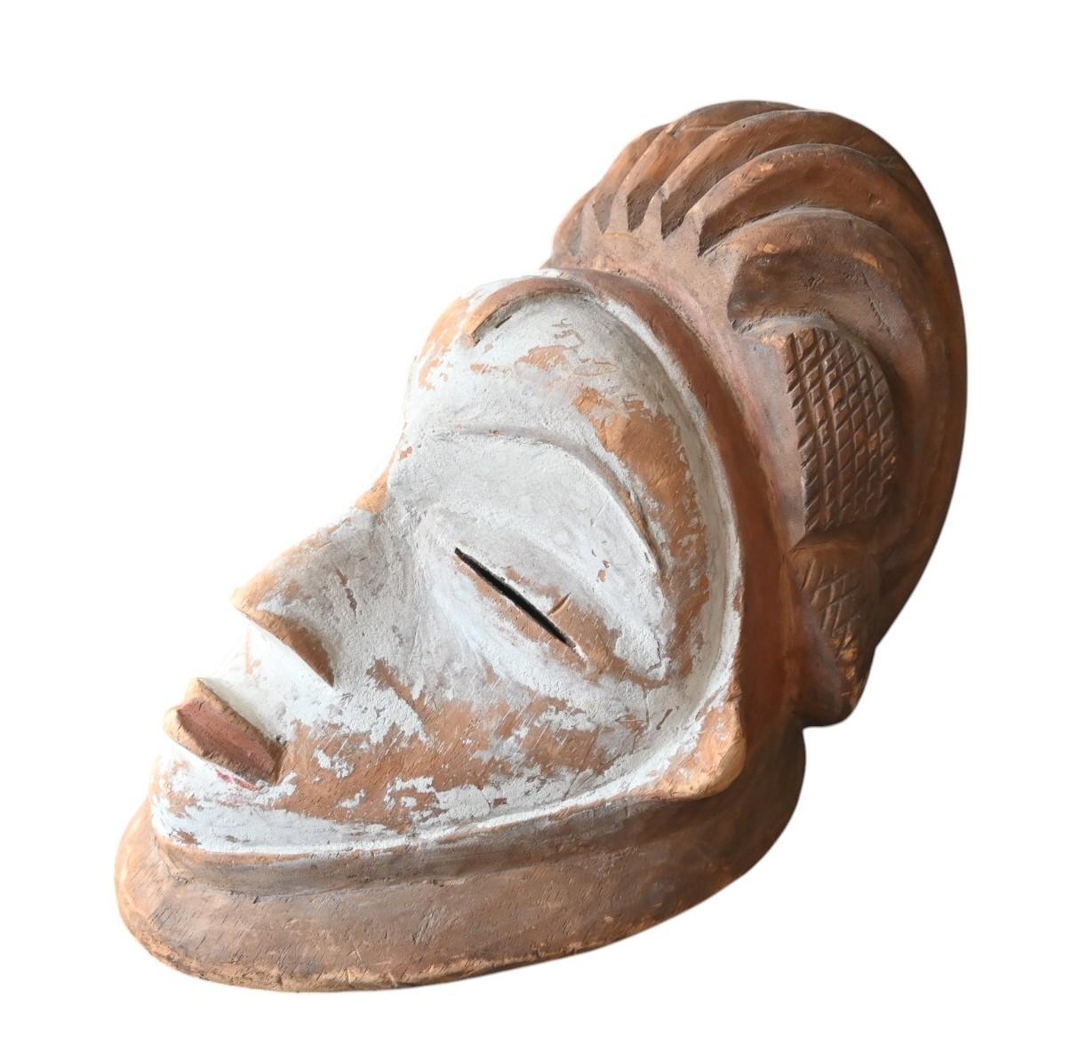 Tribal Genuine wooden mask from the Punu tribe, Gabon , first half 20th century For Sale