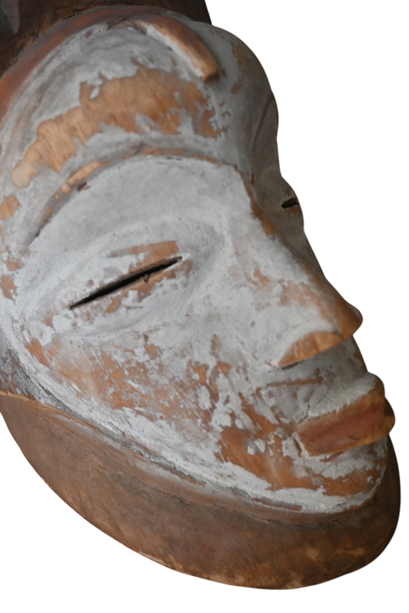 Wood Genuine wooden mask from the Punu tribe, Gabon , first half 20th century For Sale