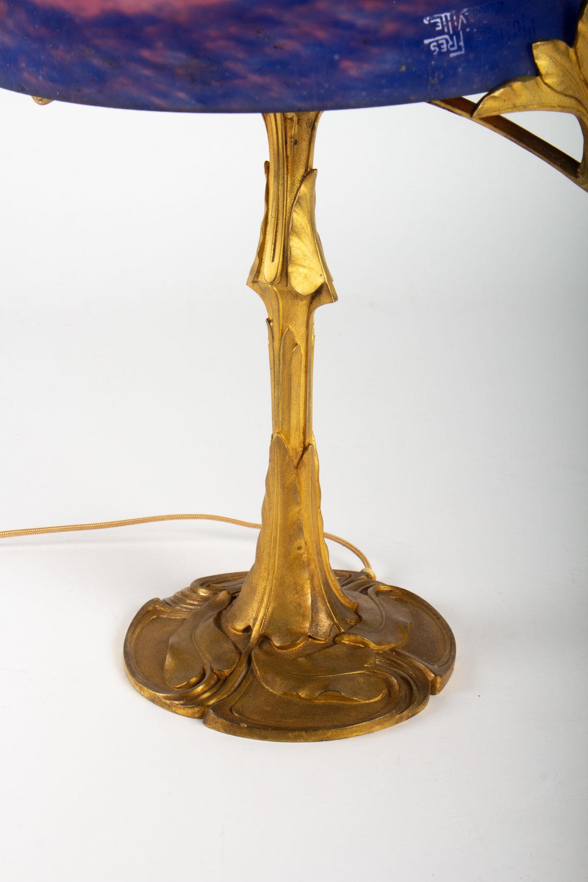 Early 20th Century Geo Lamp Spring and Muller Brothers Luneville Gilt Bronze and Glass Paw