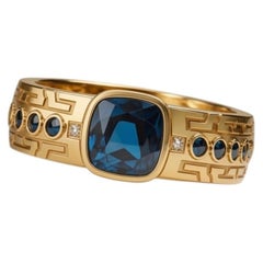 Anillo GEO para hombre con topacio azul de Londres en oro amarillo de 18 quilates
