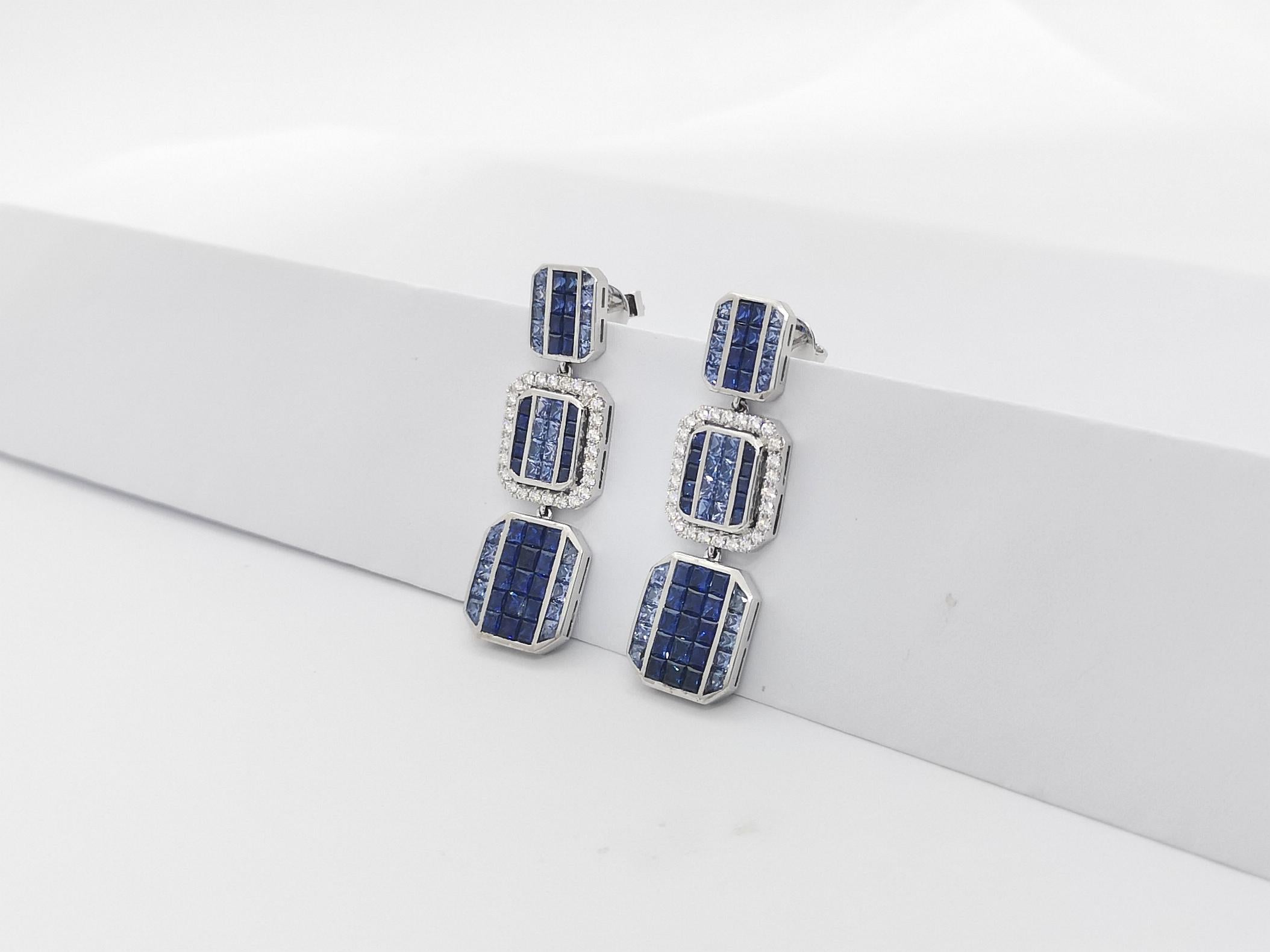 Blue Sapphire 5.42 carats and Diamond 0.52 carat Earrings 18K White Gold

Width: 1.3 cm
Length: 1.6 cm
Weight: 3.07 grams

A striking combination of perfectly cut princess-cut and baguette-cut diamonds, this pair promises versatility and