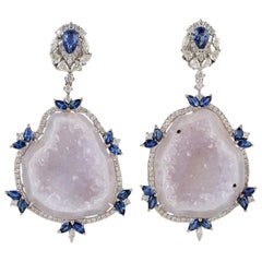 Boucles d'oreilles géométriques en or 18 carats avec saphir bleu et diamant