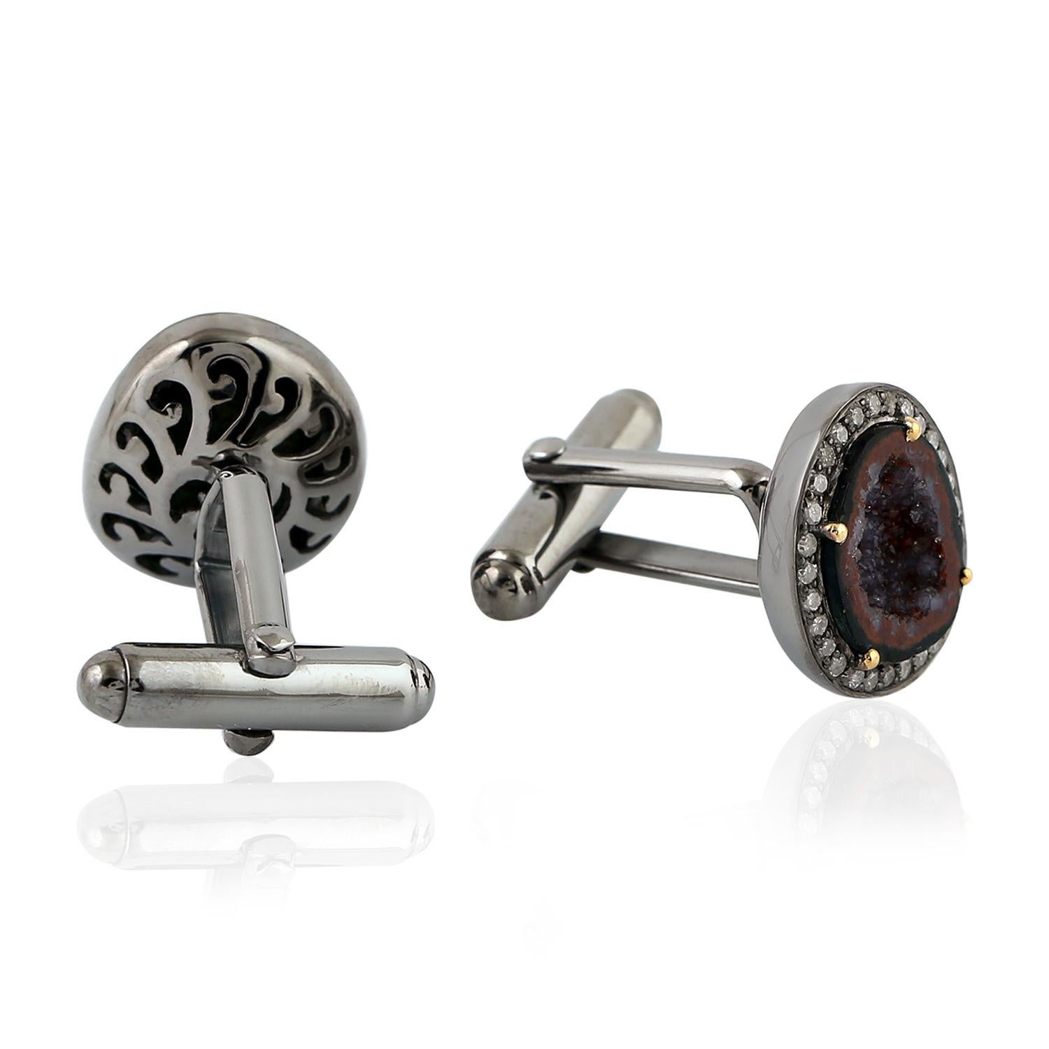 Cast from 18-karat gold and sterling silver, these cuff links are hand set with natural geodes and .50 carats of pave diamonds in black rhodium.

FOLLOW  MEGHNA JEWELS storefront to view the latest collection & exclusive pieces.  Meghna Jewels is