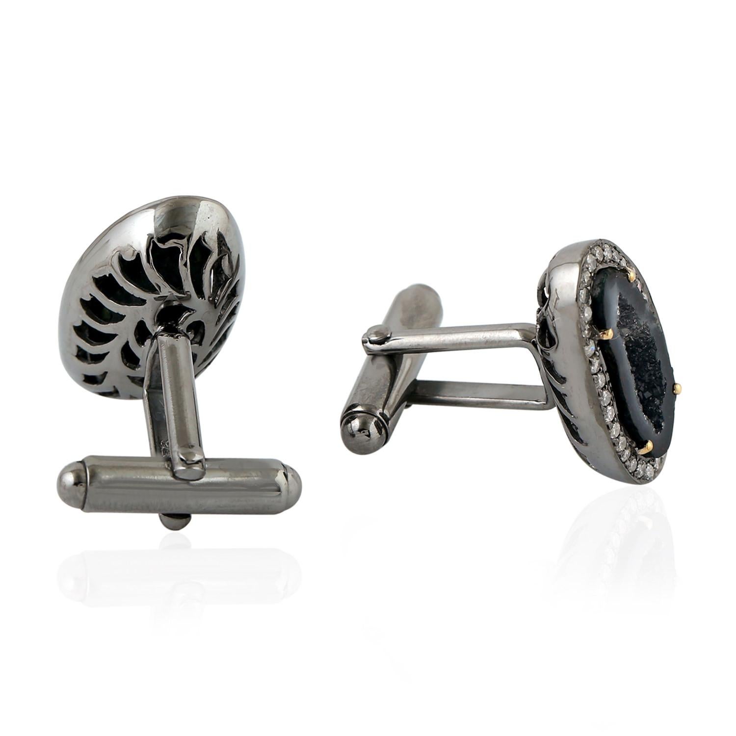 Cast from 18-karat gold and sterling silver, these cuff links are hand set with natural geodes and .70 carats of pave diamonds in black rhodium.

FOLLOW  MEGHNA JEWELS storefront to view the latest collection & exclusive pieces.  Meghna Jewels is