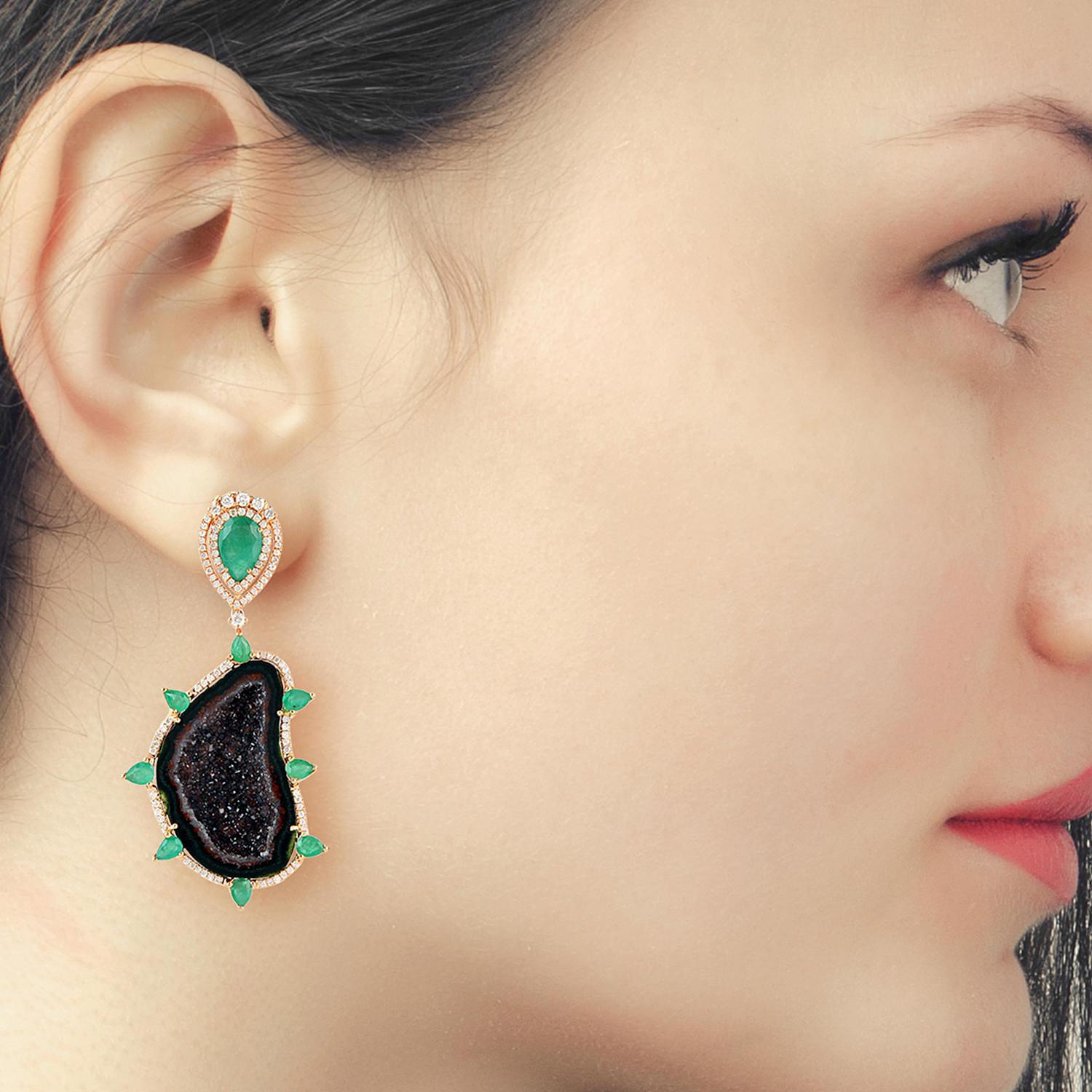 A stunning earrings handmade in 18K gold.  It is set in natural geodes, 4.62 carats emerald and 1.18 carats diamonds. 

FOLLOW  MEGHNA JEWELS storefront to view the latest collection & exclusive pieces.  Meghna Jewels is proudly rated as a Top