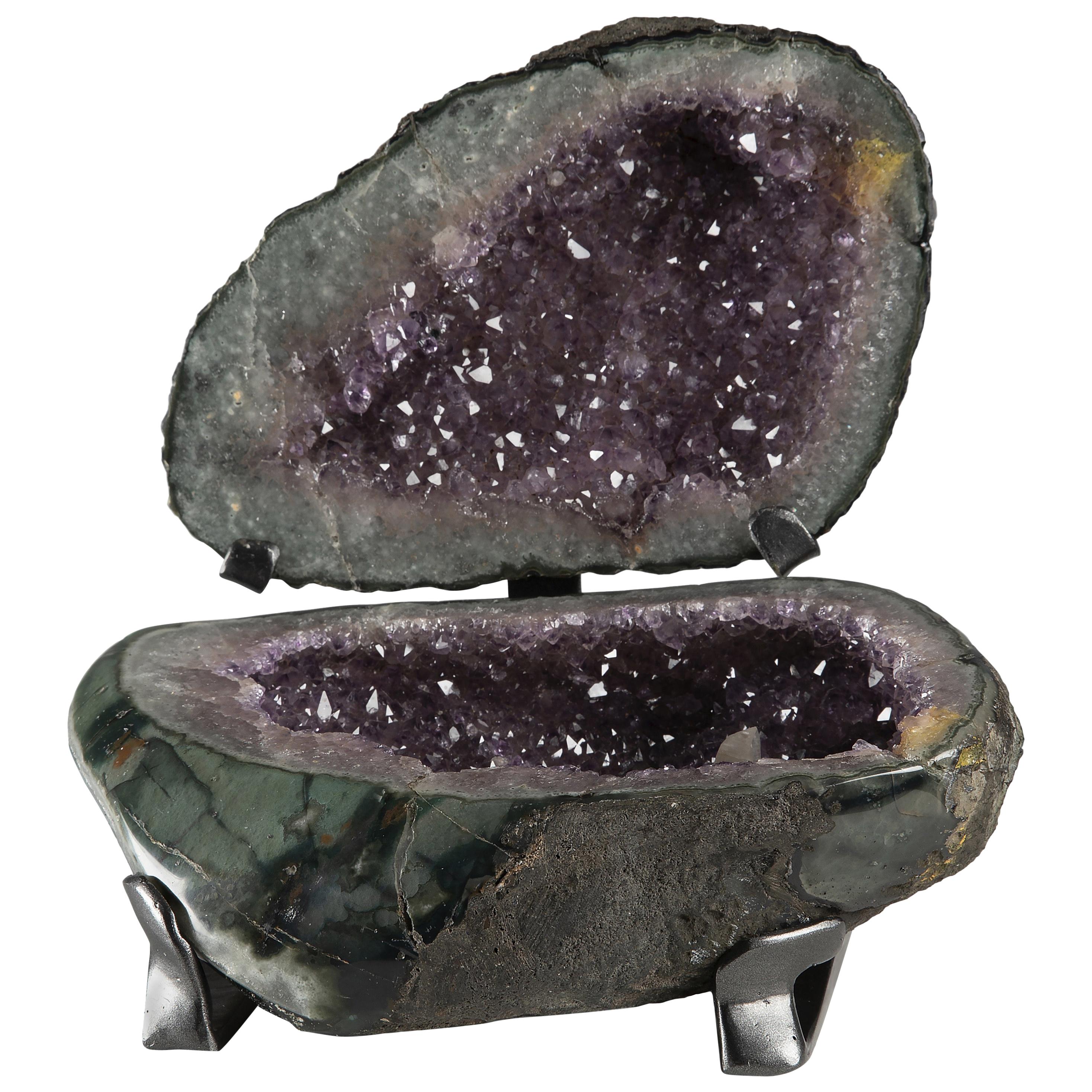 Geode Split in Two Amethyst Surrounded by White Quartz and a Calcite Formation
