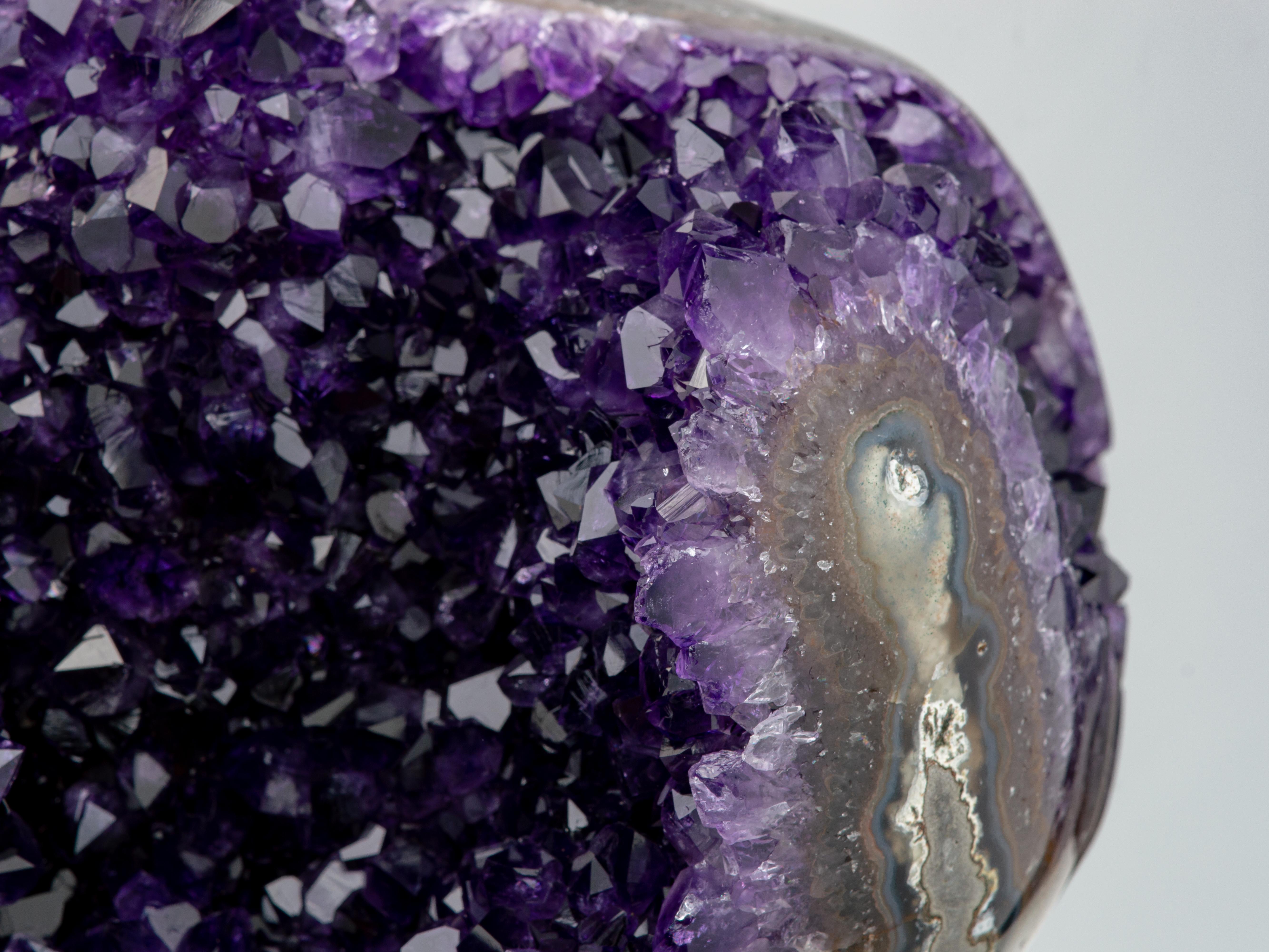 Geode with deep purple amethyst crystals, a central stalactite and agate borders For Sale 2