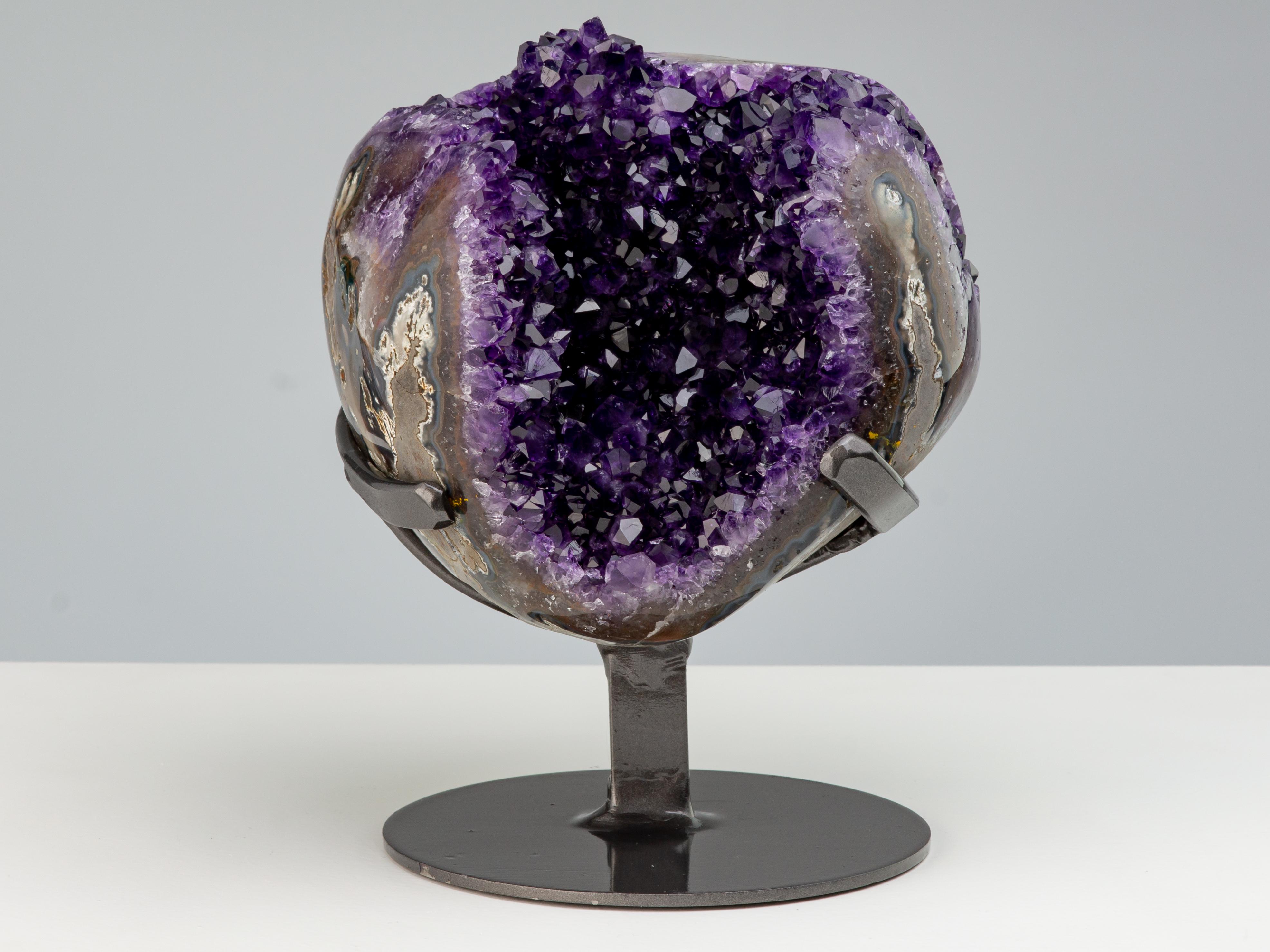 Uruguayan Geode with deep purple amethyst crystals, a central stalactite and agate borders For Sale