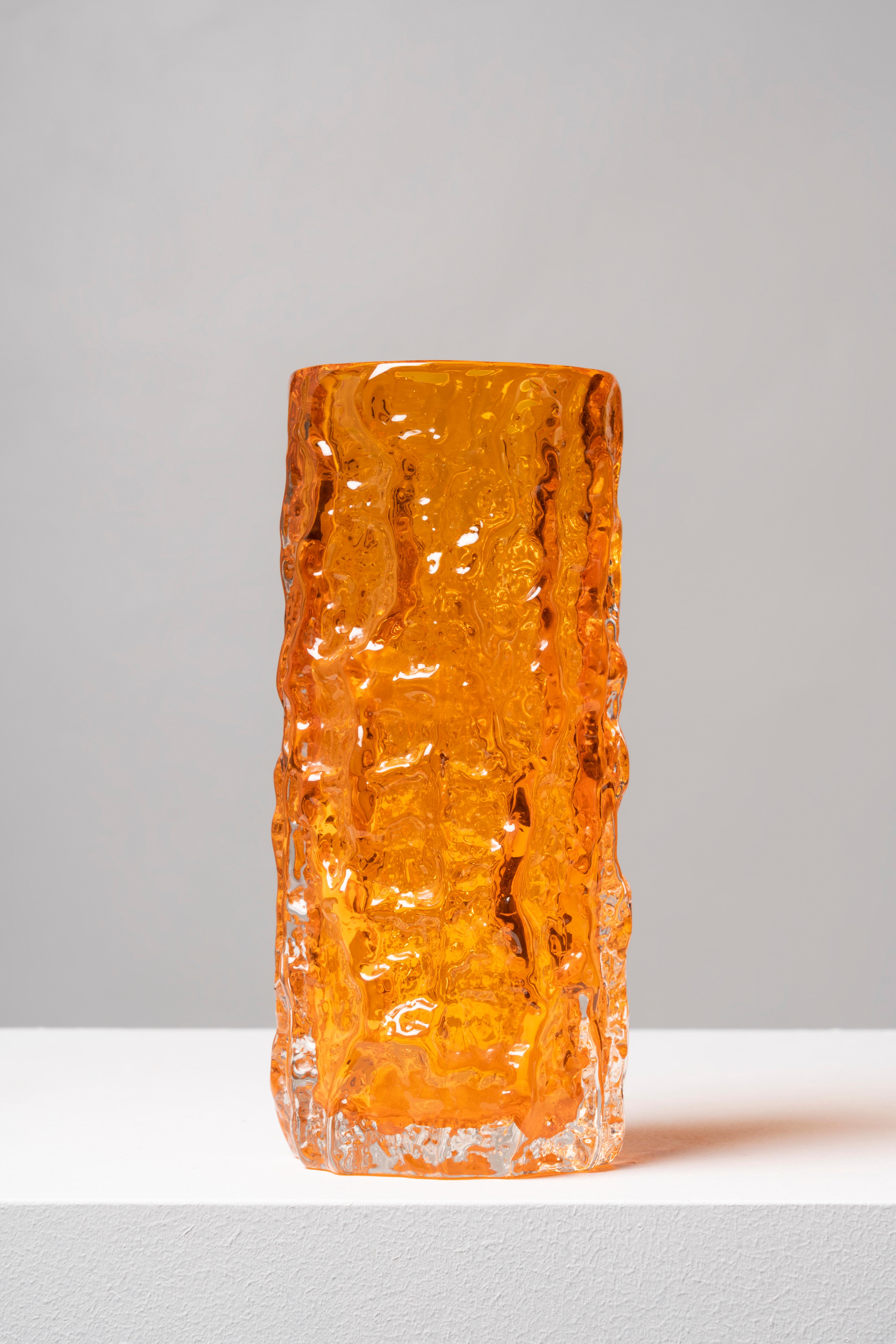 The design of this piece was the brainchild of Geoffrey Baxter, who joined Whitefriars in 1954, bringing a renewed air to the firm and creating a successful range of textured glass in 1967. The Bark model is one of the earliest examples of the