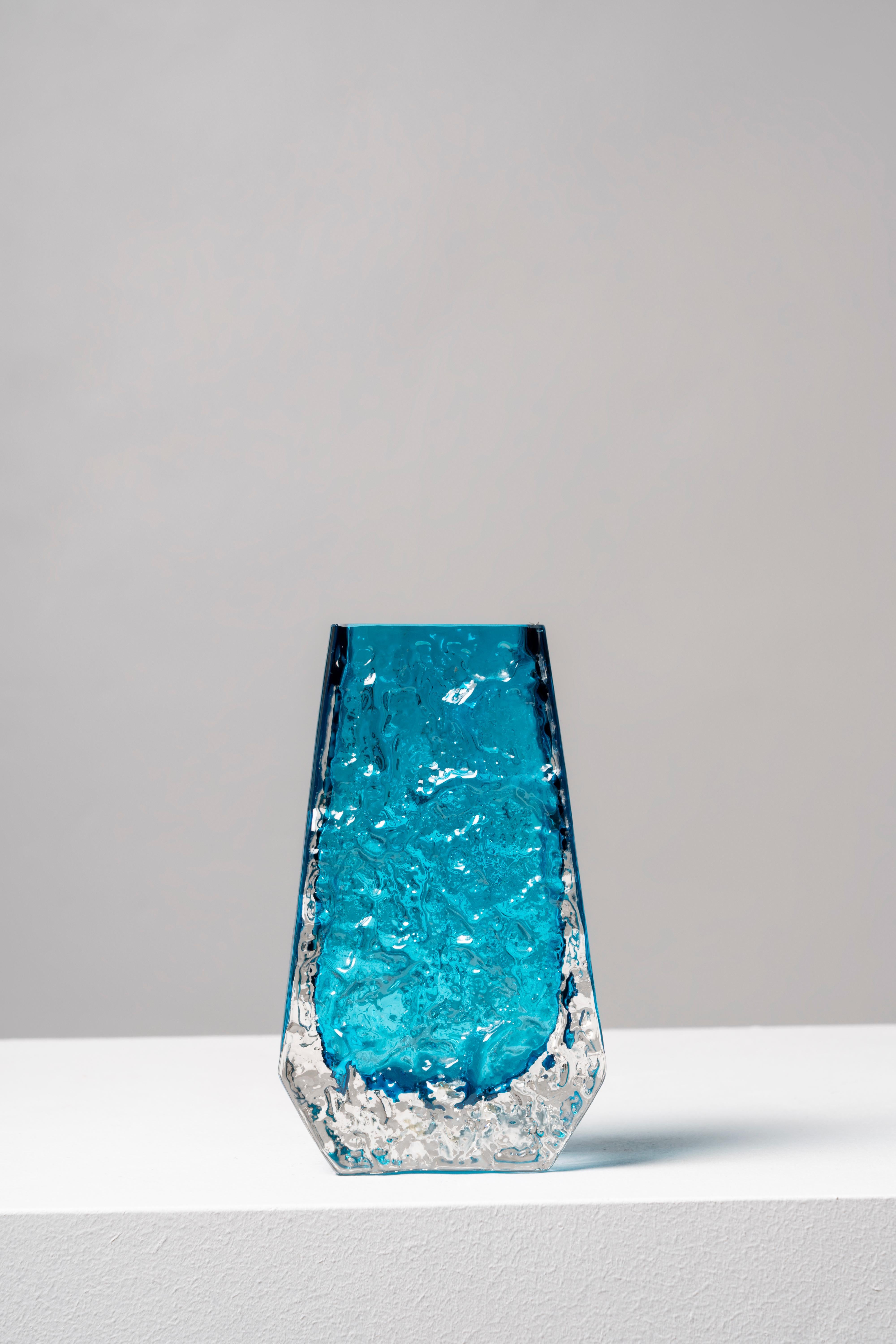 The design of this piece was the brainchild of Geoffrey Baxter, who joined Whitefriars in 1954, bringing a renewed air to the firm and creating a successful range of textured glass in 1967. The Bark model is one of the earliest examples of the