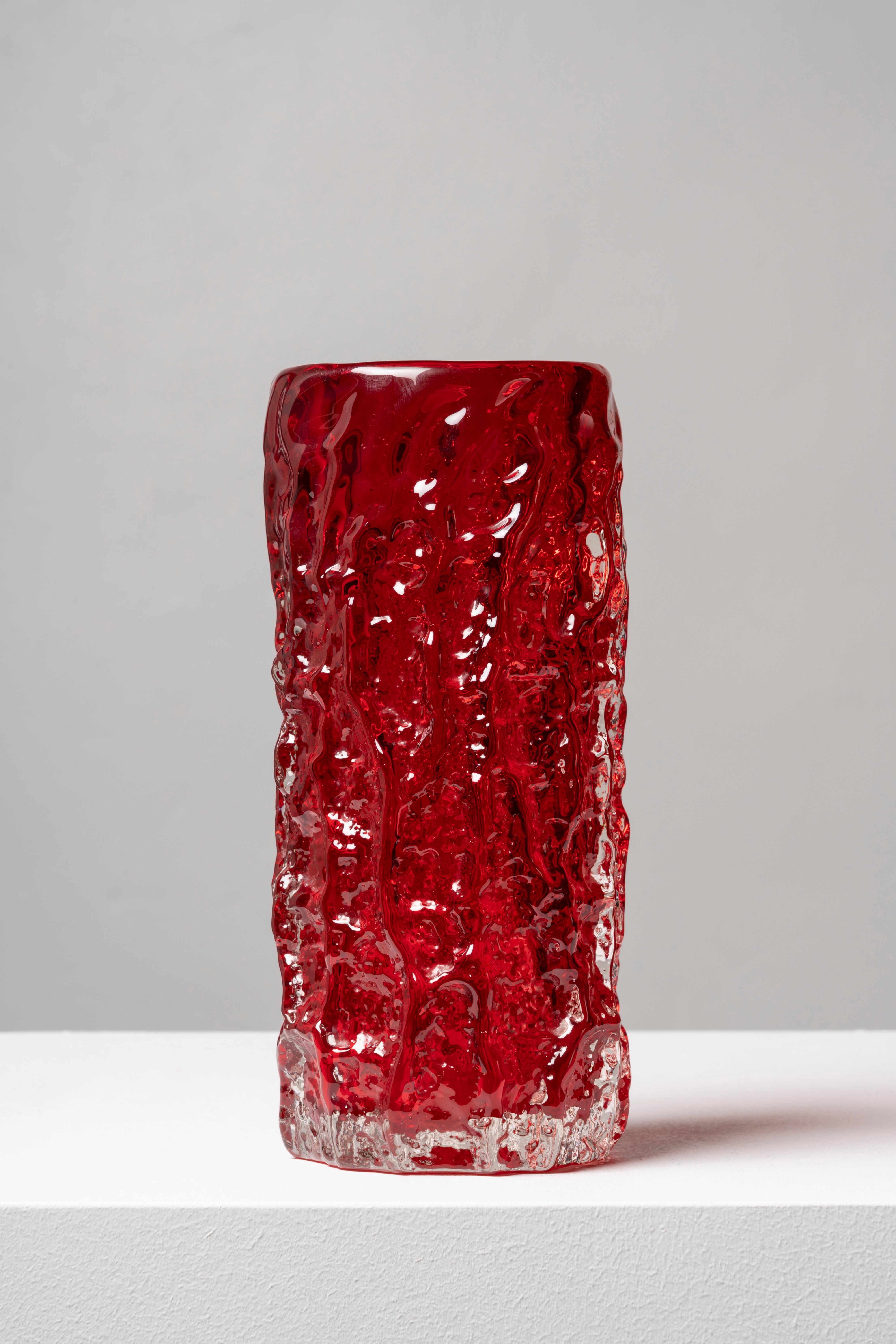 The design of this piece was the brainchild of Geoffrey Baxter, who joined Whitefriars in 1954, bringing a renewed air to the firm and creating a successful range of textured glass in 1967. The Bark model is one of the earliest examples of the