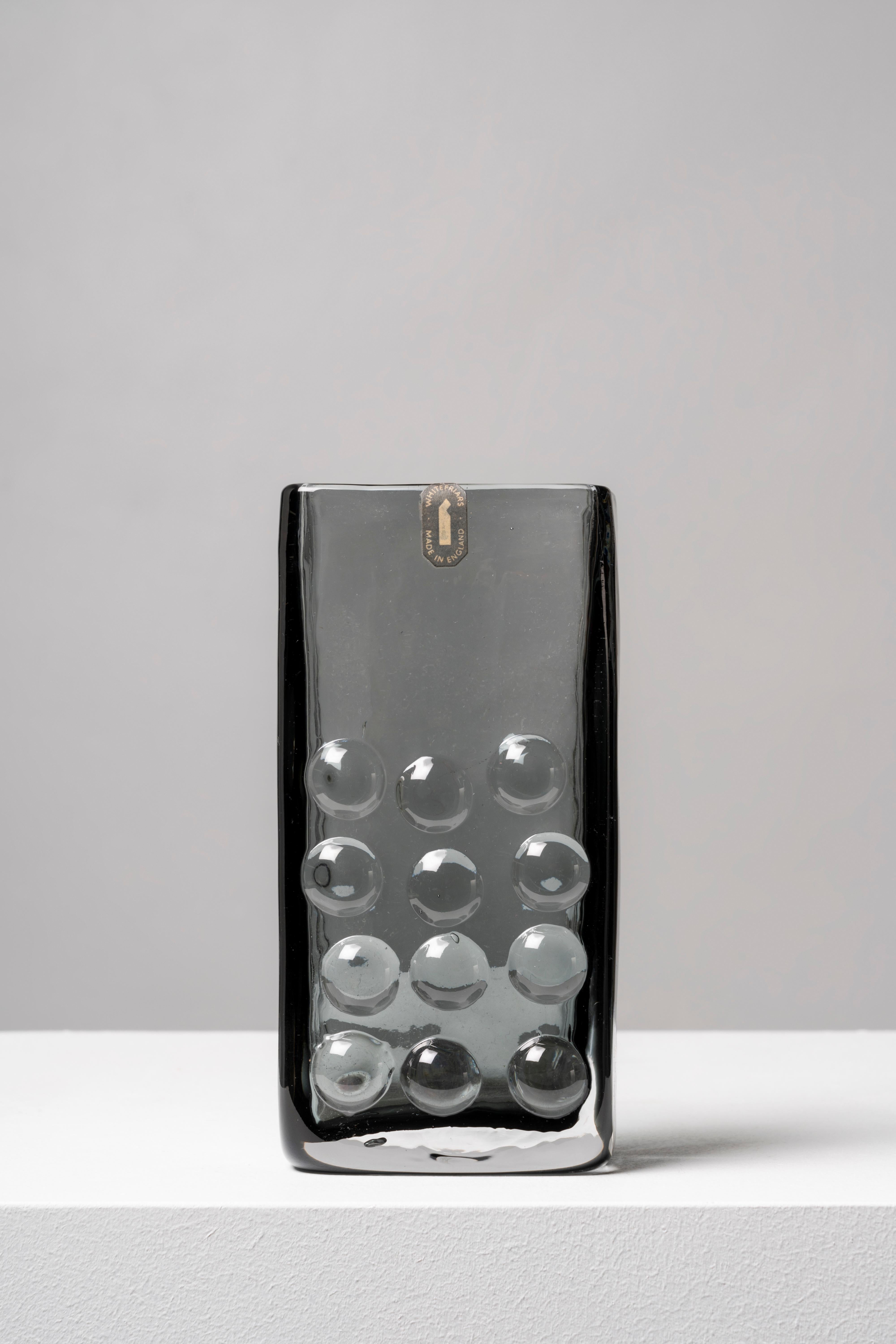 The design of this piece was the brainchild of Geoffrey Baxter, who joined Whitefriars in 1954, bringing a renewed air to the firm and creating a successful range of textured glass in 1967. The Bark model is one of the earliest examples of the