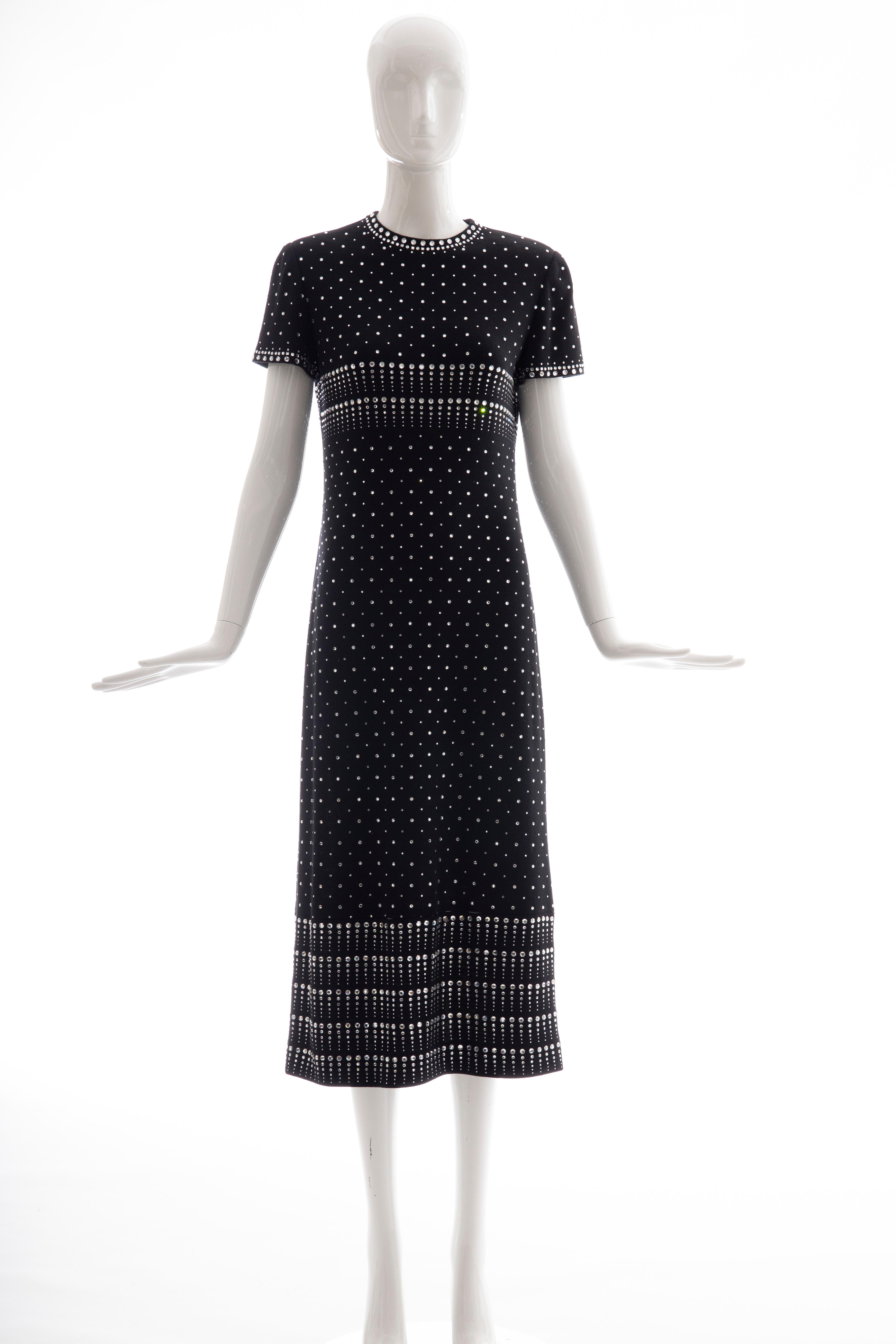 Geoffrey Beene, Fall 1966 black wool knit evening dress with appliquéd rhinestines, cap sleeve with back zip and hook-and-eye closure.

Archived at the Museum of Fine Art in Boston and the Museum at FIT.

US. 8
Bust: 33, Waist: 32, Hips: 40,