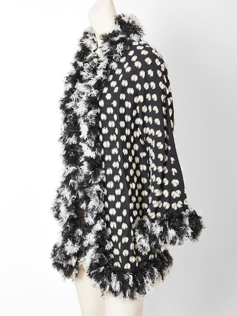 Geoffrey Beene,  whimsical, black and white jacket having a 