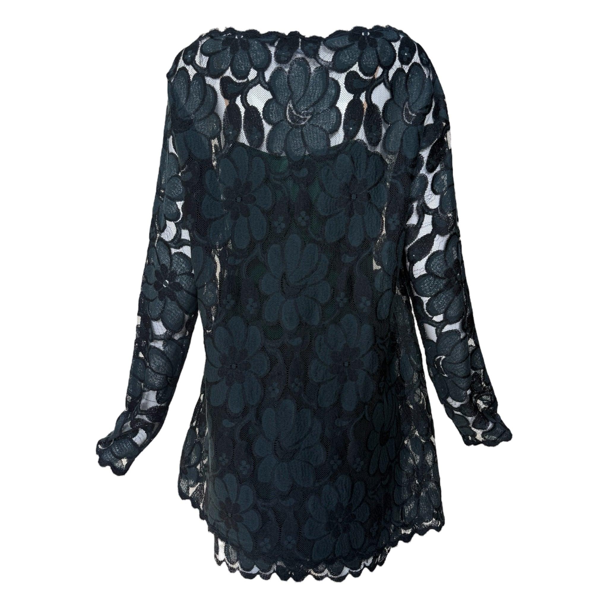 Geoffrey Beene 1980's floral lace dress in a deep jewel tone emerald green. Lush layering of intricate floral lace over a silk and lace inner slip. Elegant wide neck. Exquisite eyelash lace. Lace dress opens pullover style with the slip opening with