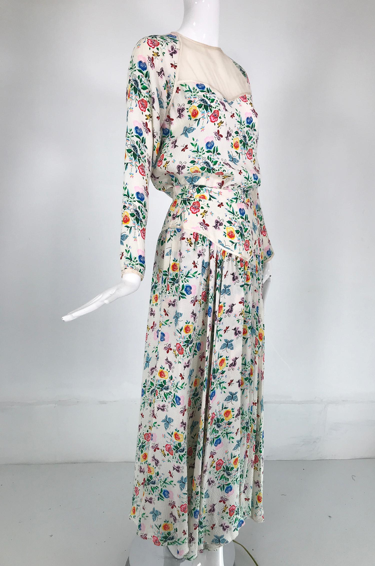 Geoffrey Beene floral cloque silk with off white sheer upper bodice, front & back from the 1970s. Lightweight silk with a texture, in a beautiful floral print The top has raglan sleeves, the sheer bodice is separated from the silk print with a band