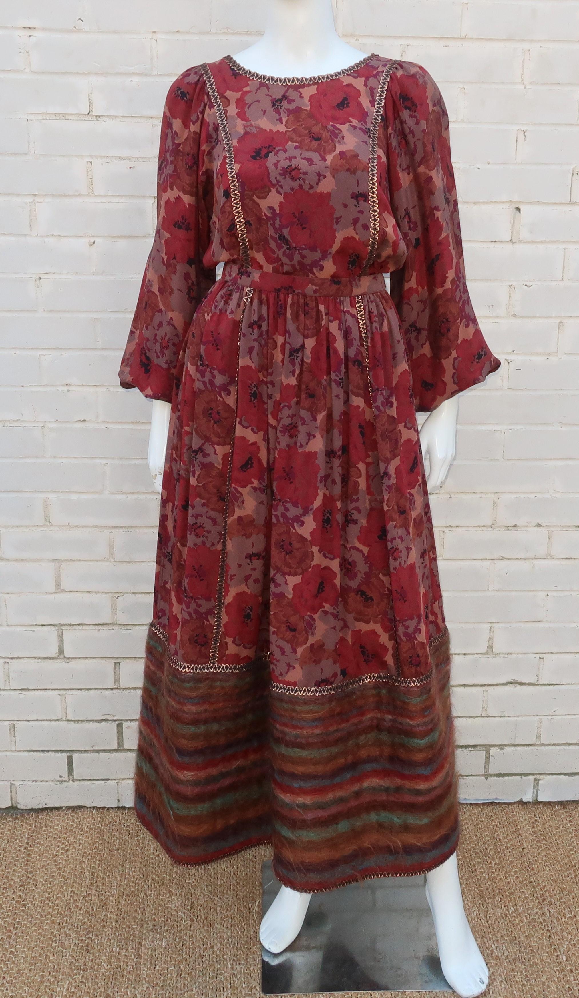 Geoffrey Beene's two piece dress ensemble is a masterful mix of a casual peasant style silhouette with luxurious details including a gorgeous silk crepe fabric, coppery bronze metallic braid trim and a mohair hemline.  The autumnal colors of the