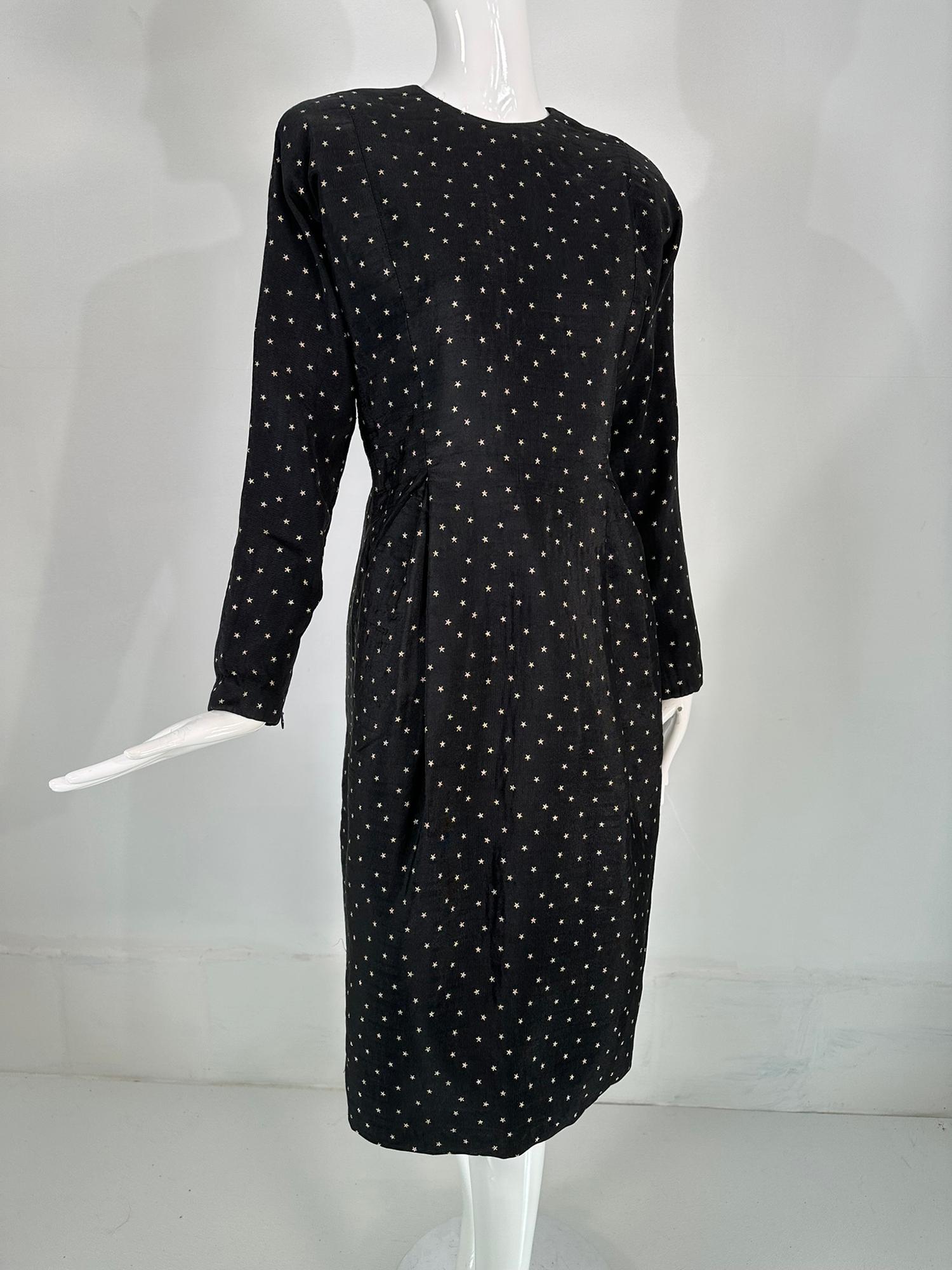 Geoffrey Beene embroidered gold stars on black faille button back dress from the 1980s. Geoffrey Beene's clothing is sophisticated with a bit of whimsy, his fabric choices, mix & match prints with textures and gorgeous silks, wool,  linens, you name