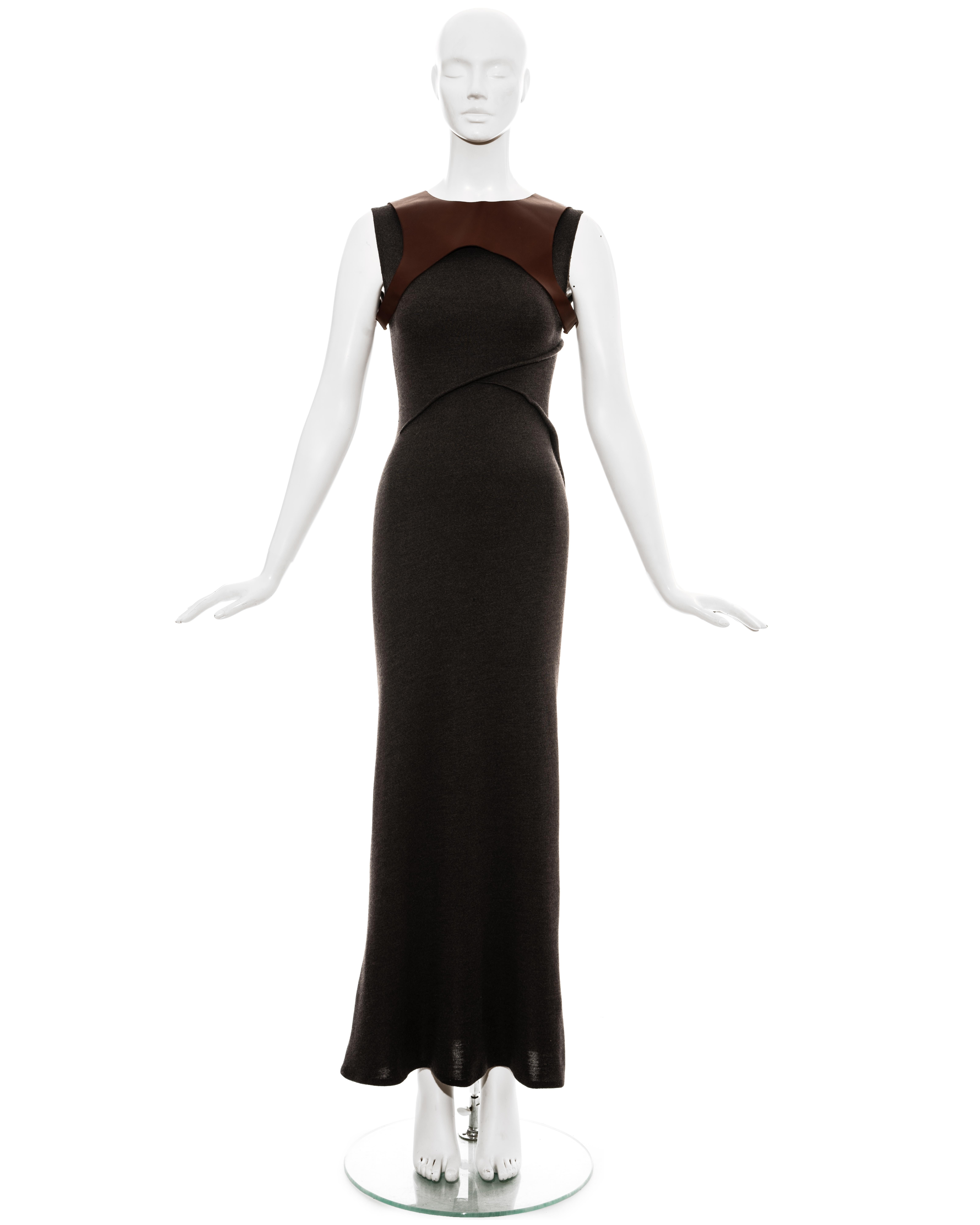 Geoffrey Beene grey wool jersey one seam maxi dress with tubular padded darts around torso and brown leather backless harness. 

Spring-Summer 1999