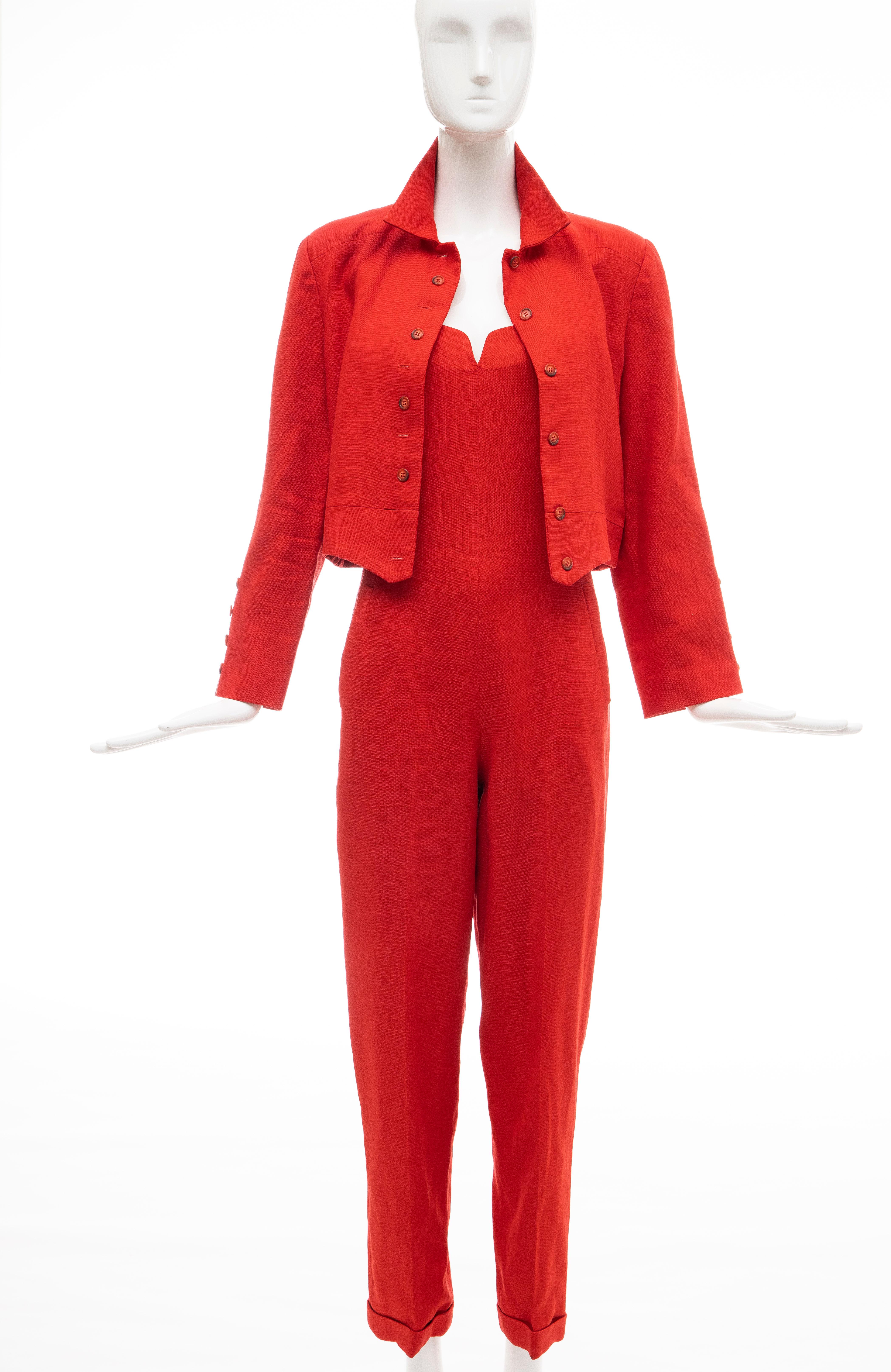 Geoffrey Beene, Circa:1970's red linen jumpsuit with two front pockets, back zip & hook-and-eye closure and fully lined in silk. Button front jacket fully lined in red silk with black polka dots.

US. 8
Jumpsuit: Bust: 33, Waist: 30, Hip: 38,
