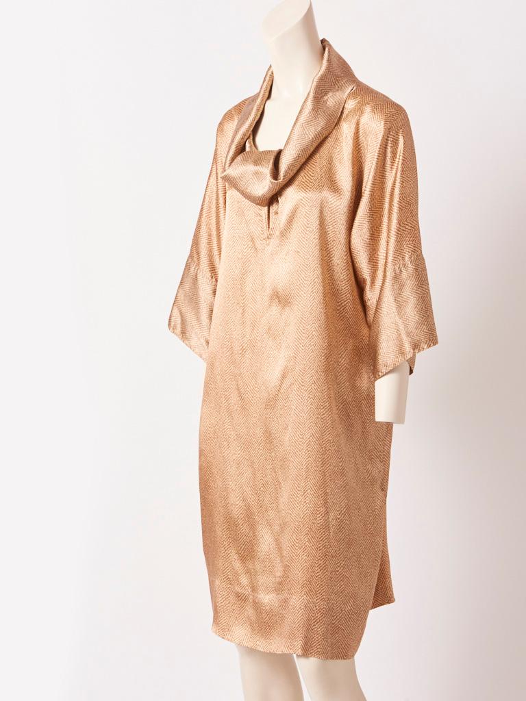 Geoffrey Beene, herringbone pattern, silk charmeuse, shift style day dress, having a soft, cowl neck, collar and kimono like 3/4 sleeves. C. late 70's