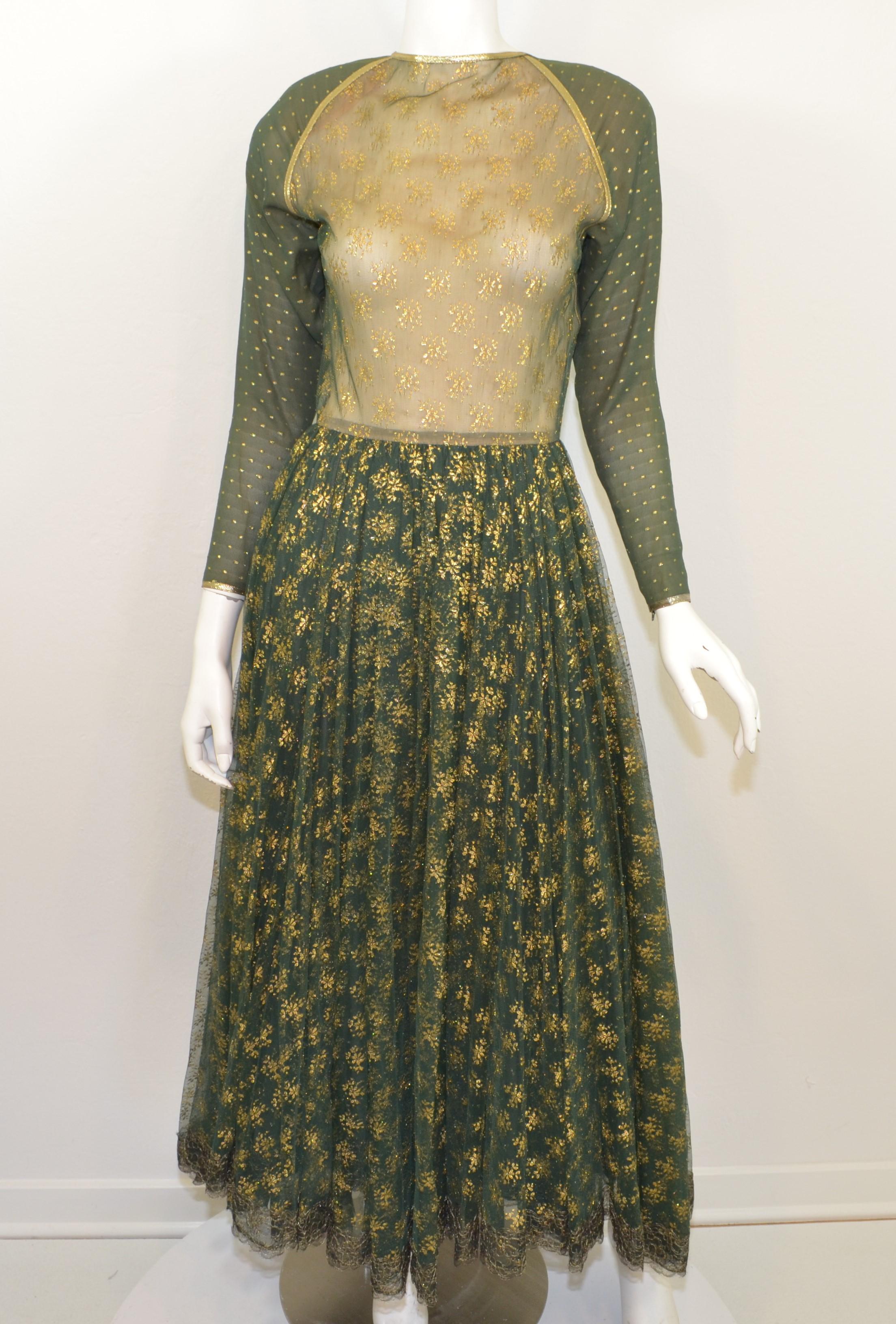 Geoffrey Beene gown featured in a forest green with gold threading throughout. Dress has a back zipper closure with buttons, sleeves have zippers along the cuffs.

Bust 30”
Waist 25”
Hips 42”
Length 54”