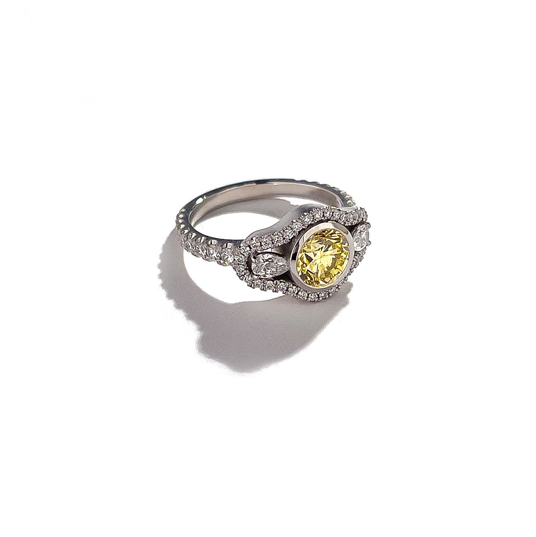 One-of-a-kind yellow and white natural diamond engagement/cocktail ring created by Geoffrey Good.

Handmade in our NYC workshop. Platinum and 18k Yellow Gold. 

Total diamond weight for the ring is 1.82 carats. The ring features a single natural
