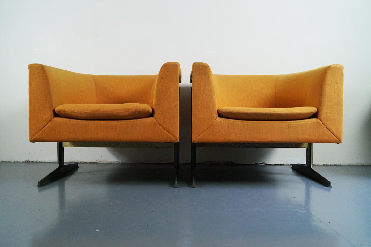 G. Harcourt, rare ‘Model 042' lounge chairs, prototype, 1963 'London Combination' Polished stainless steel metal base, with original orange upholstered seat. Some slight blemishes on the metal structure and the fabric. Labelled by Maker.