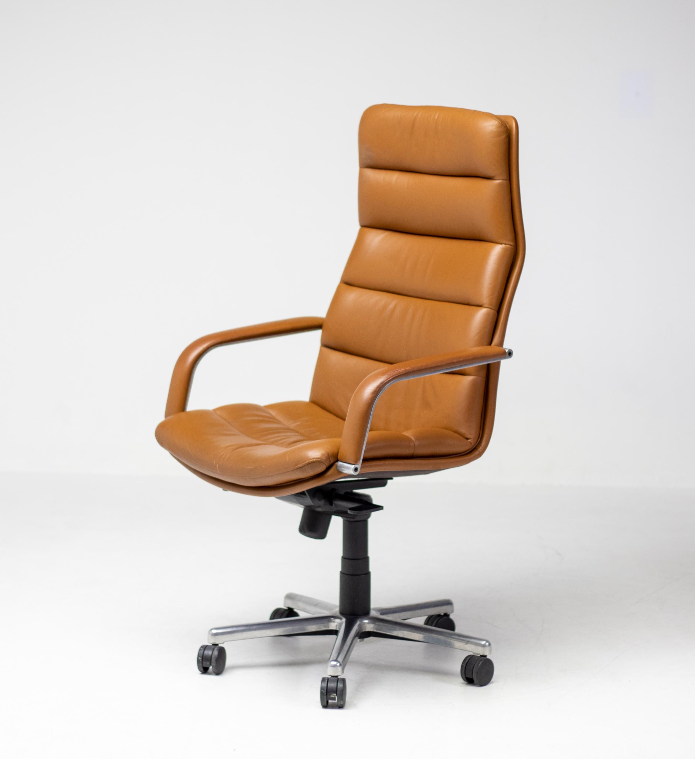 Geoffrey Harcourt for Artifort tilt/swivel desk chairs in aluminum and leather, The Netherlands, 1970s.
These executive chairs where designed by Geoffrey Harcourt and manufactured by Artifort in the seventies. 
Very comfortable desk chairs in