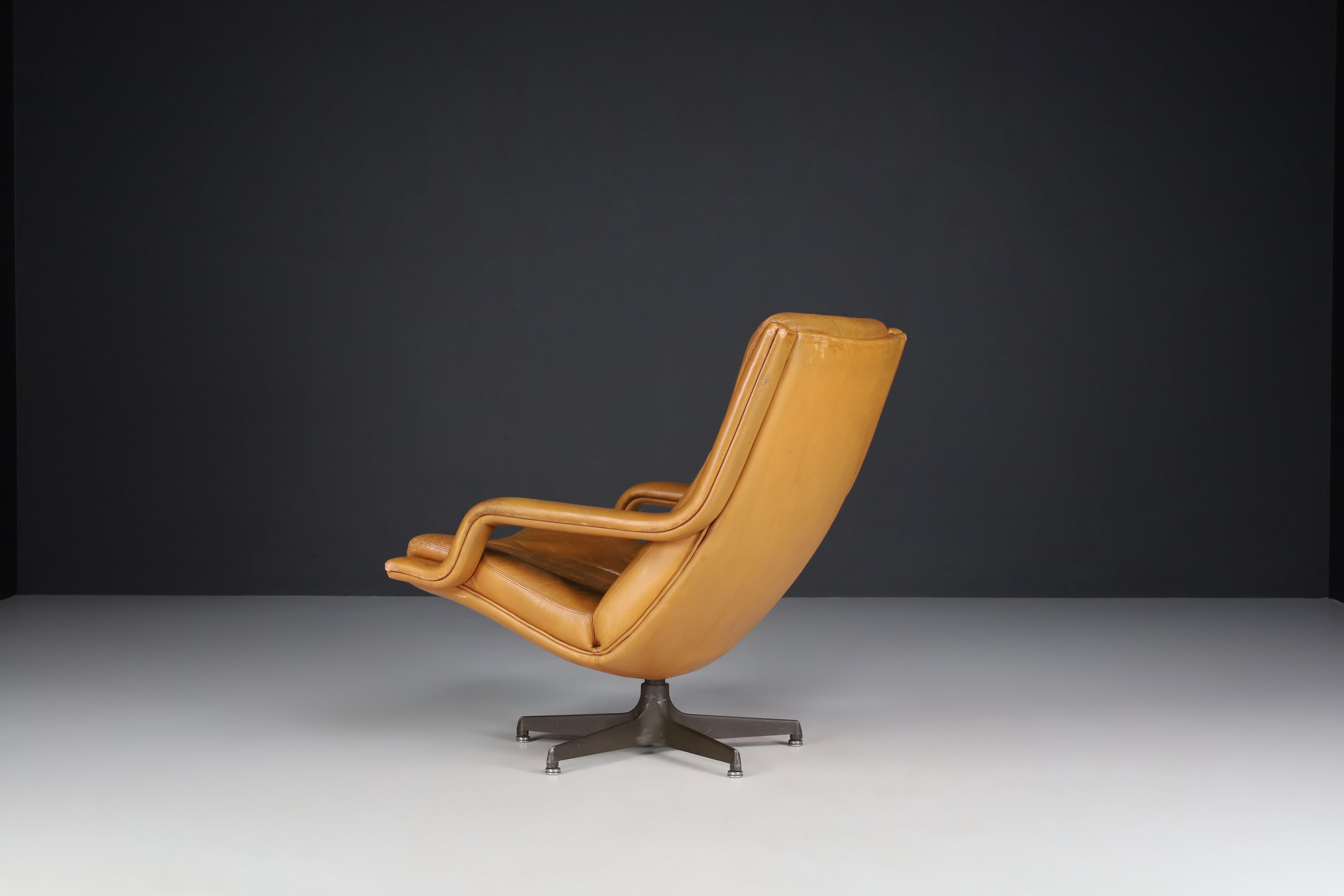 cognac leather swivel chair