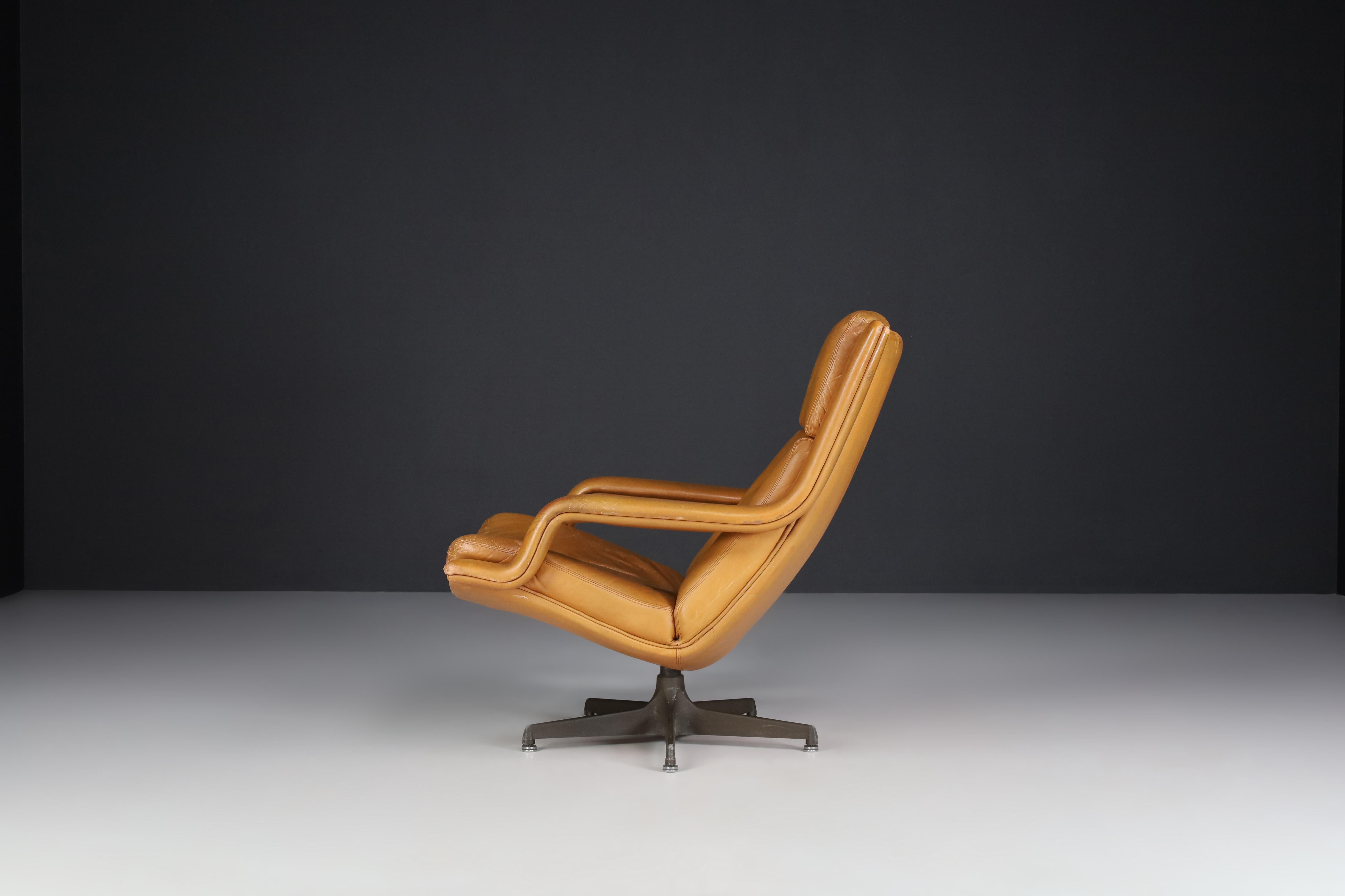 Steel Geoffrey Harcourt Patinated Cognac Leather Swivel Lounge Chair, The Netherlands  For Sale