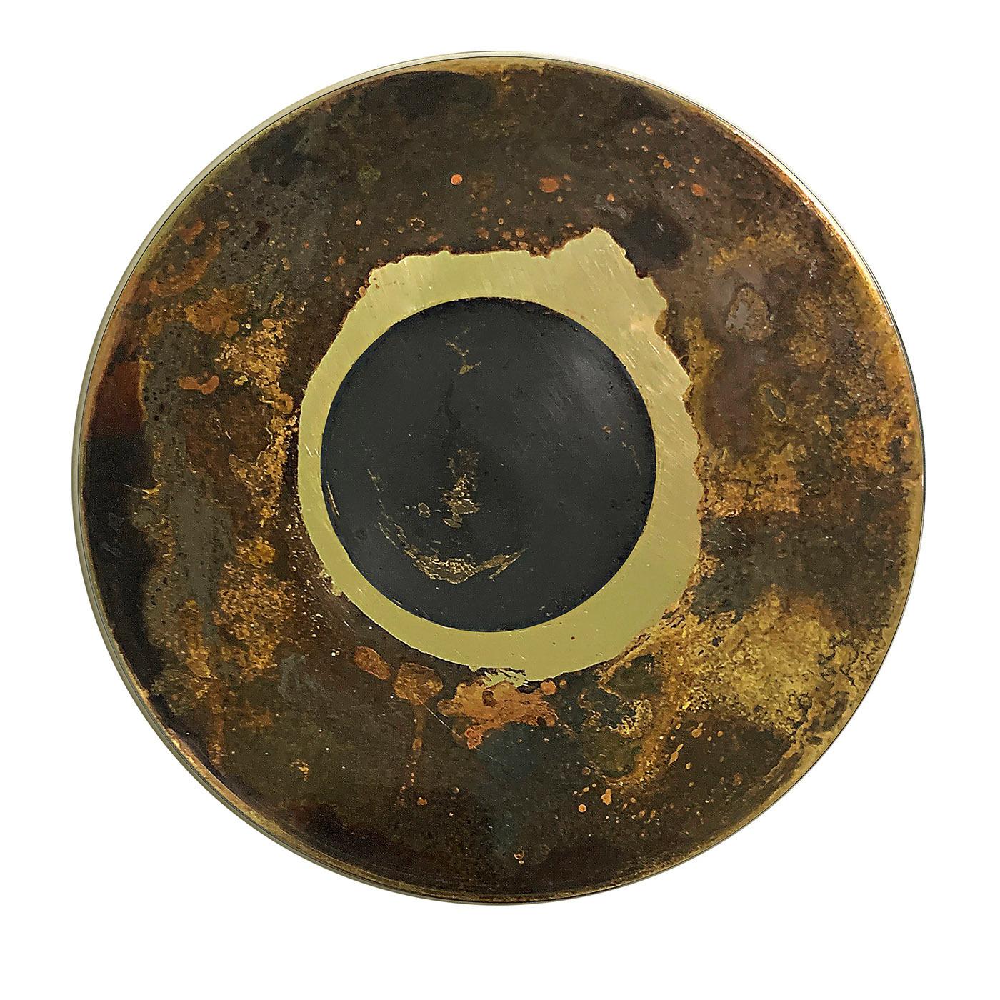 This splendid decorative disk evokes the mystery of a black hole surrounded by a golden galaxy. Its characteristic, unrepeatable aesthetic combines an intriguing corroded texture with a triumph of traceries naturally obtained with acids and oxides