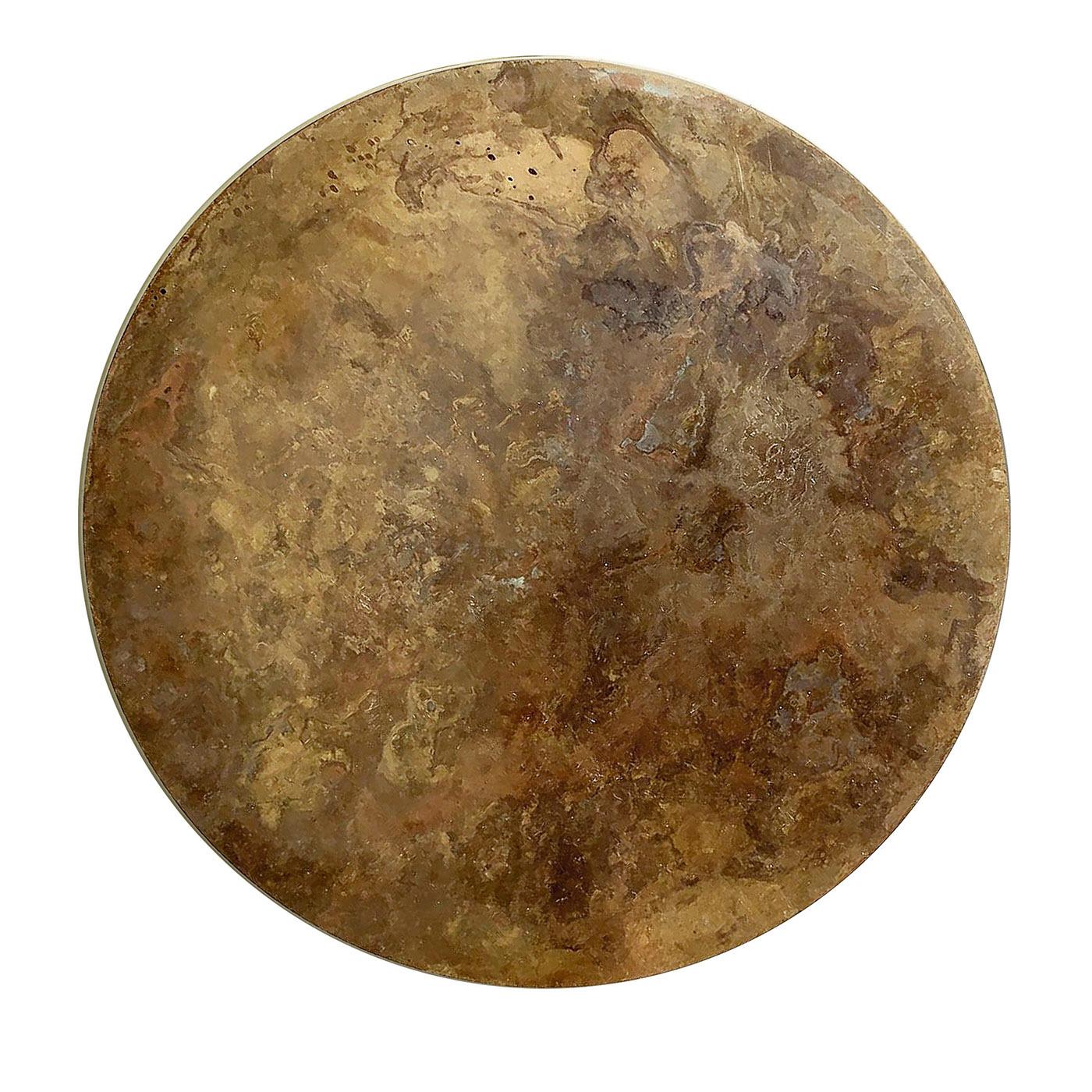 A galaxy of golden hues and intricate traceries marks this one-of-a-kind decorative disk which will serve as a splendid decorative piece for both classic and contemporary homes, alike. Crafted of brass, it is treated with acids and oxides following