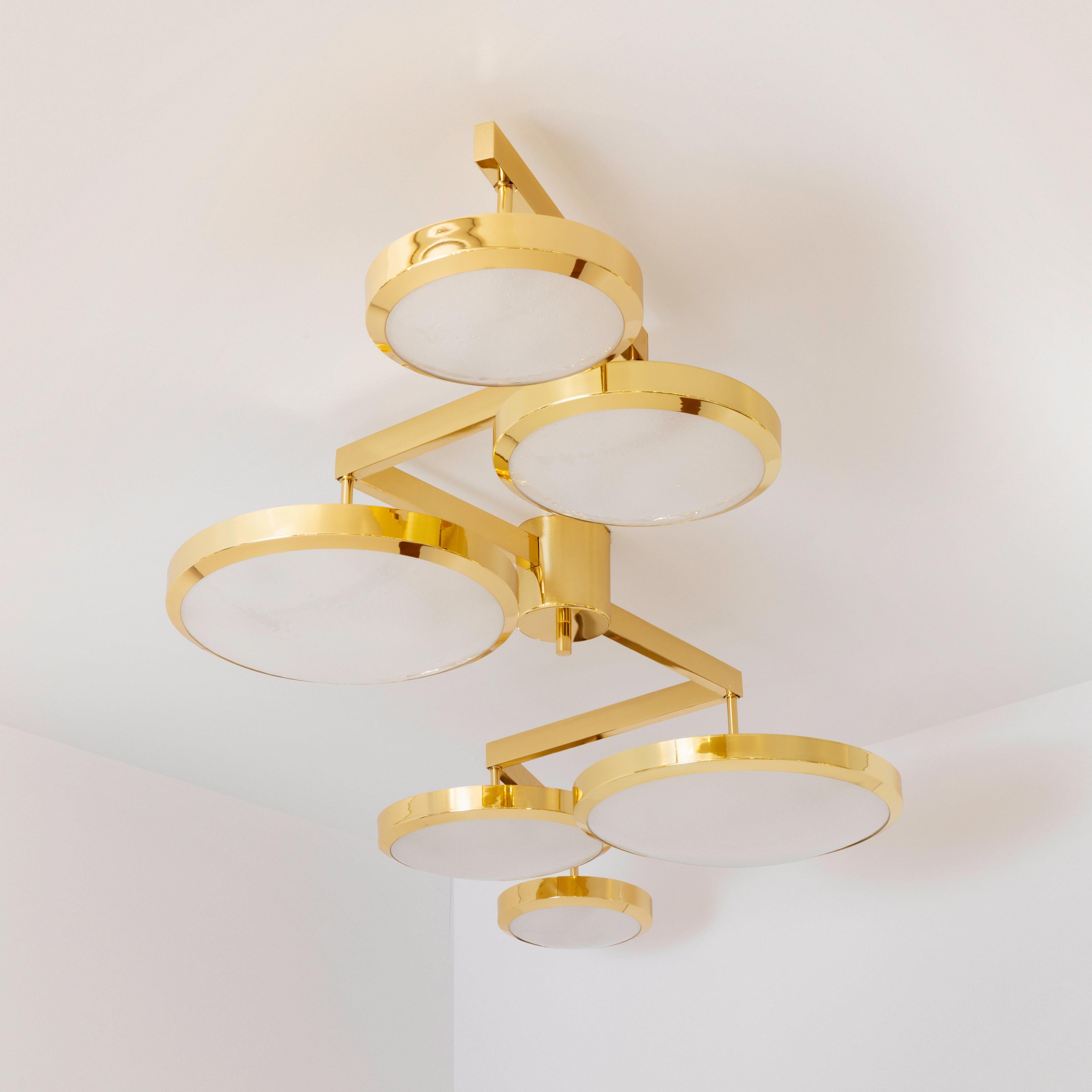 Translated in English to “suspended geometry”, the Geometria Sospesa ceiling light plays with the notion of lines and shapes. The concept is brought to life by its distinctive winding frame with six variable size shades at staggered heights. The