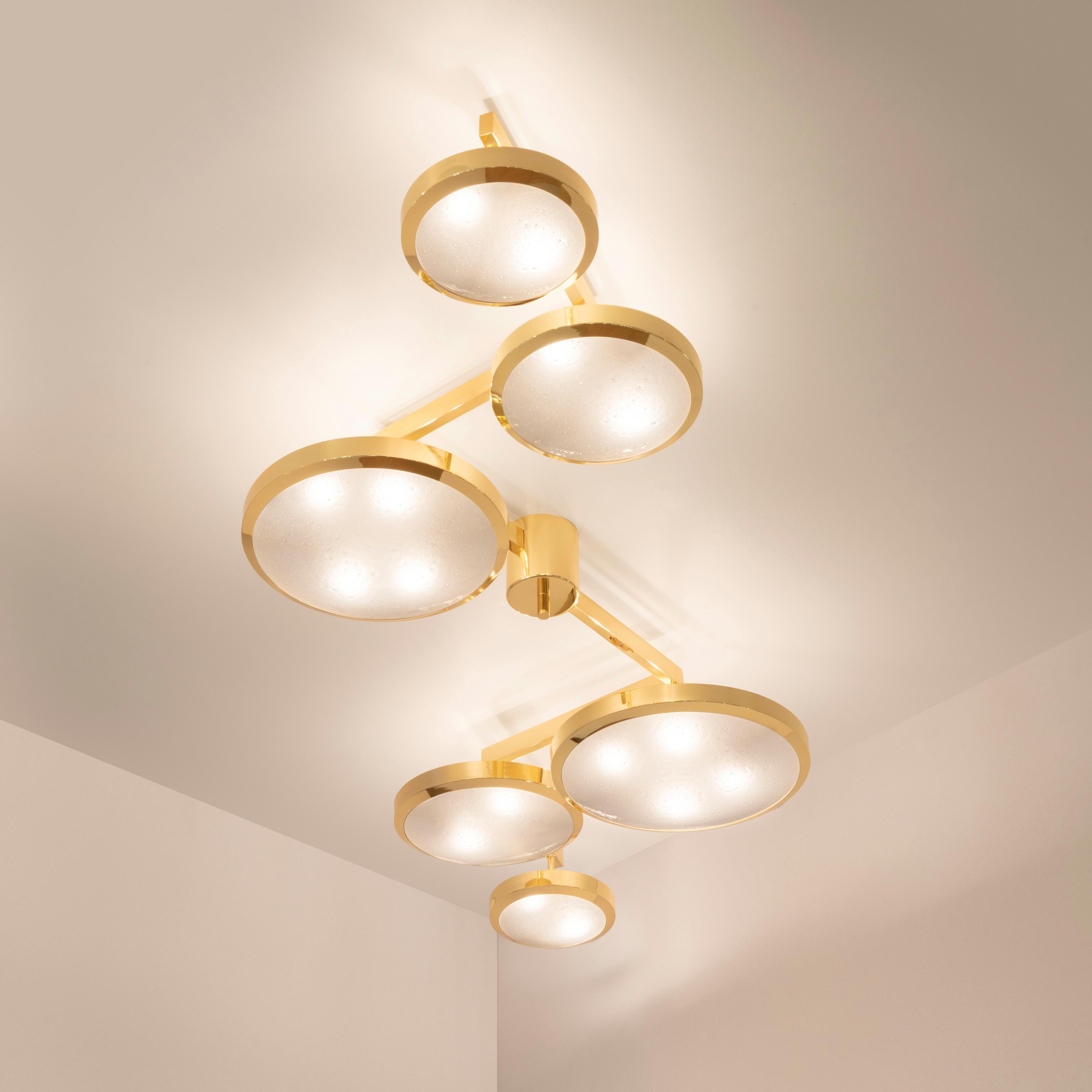 Translated in English to “suspended geometry”, the Geometria Sospesa ceiling light plays with the notion of lines and shapes. The concept is brought to life by its distinctive winding frame with six variable size shades at staggered heights. The