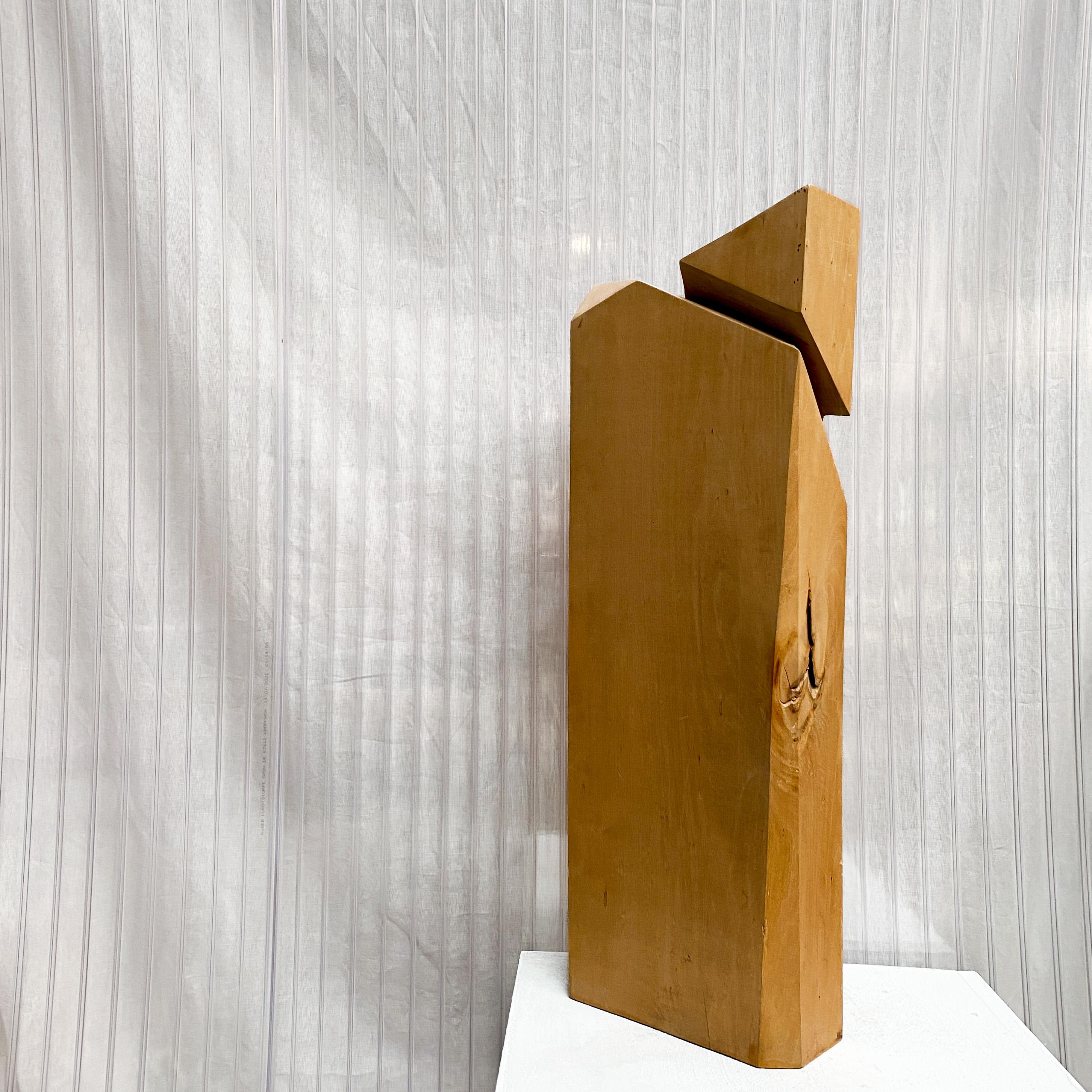 This beautiful Mid-Century Modern wooden sculpture, comes from the collection of a Dutch architect. It features a large rectangular wooden body, ending a triangular carved top which creates a striking juxtaposition and beautifully highlights the