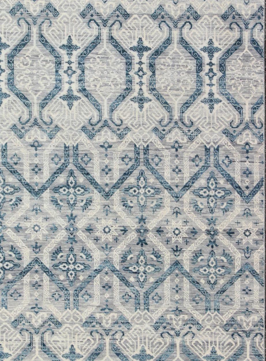 Rug/ IN-BAM-55972, Geometric Indian rug- 8'11 X 12'1. Keivan Woven Arts, This hand-woven Indian Transitional rug features a beautiful geometric design in blue, gray and ivory colors. 

Measures: 8'11 x 12'1.