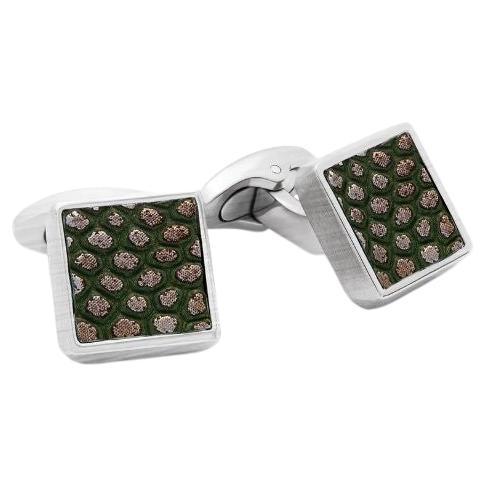 Gemelos geométricos con estampado animal y piel verde en titanio